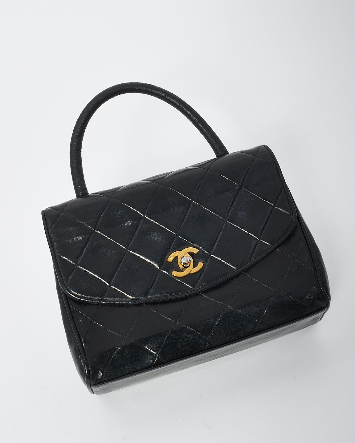 Sac Kelly en cuir d'agneau noir vintage Chanel