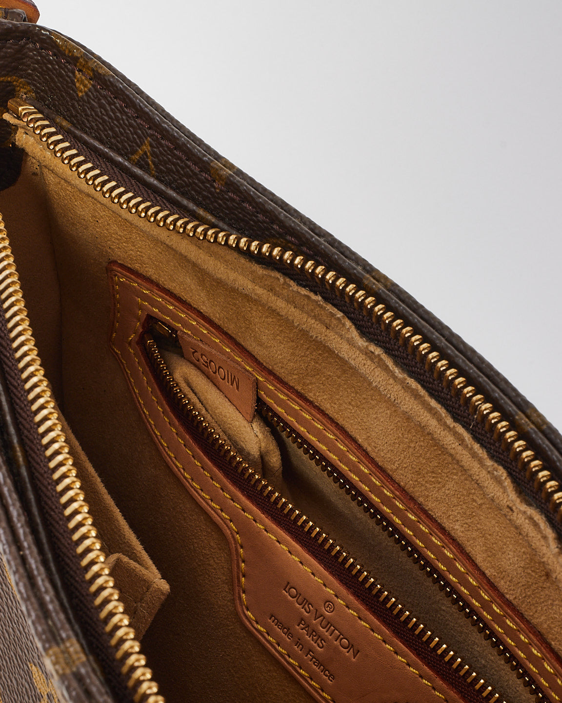 Sac MM à boucle en toile monogram Louis Vuitton