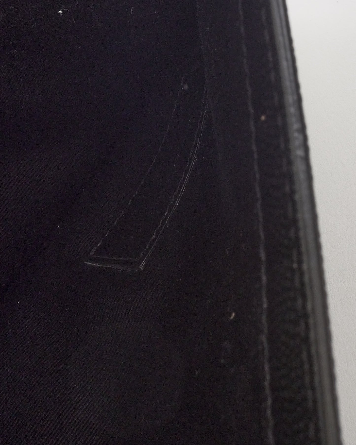 Saint Laurent Pochette So Black Uptown en cuir grainé noir