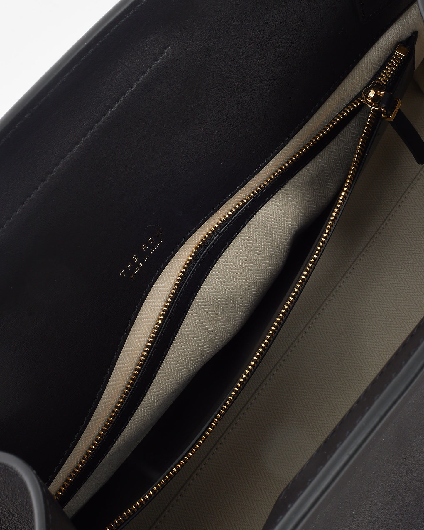 The Row Black Saddle Leather E/W Margaux Clutch