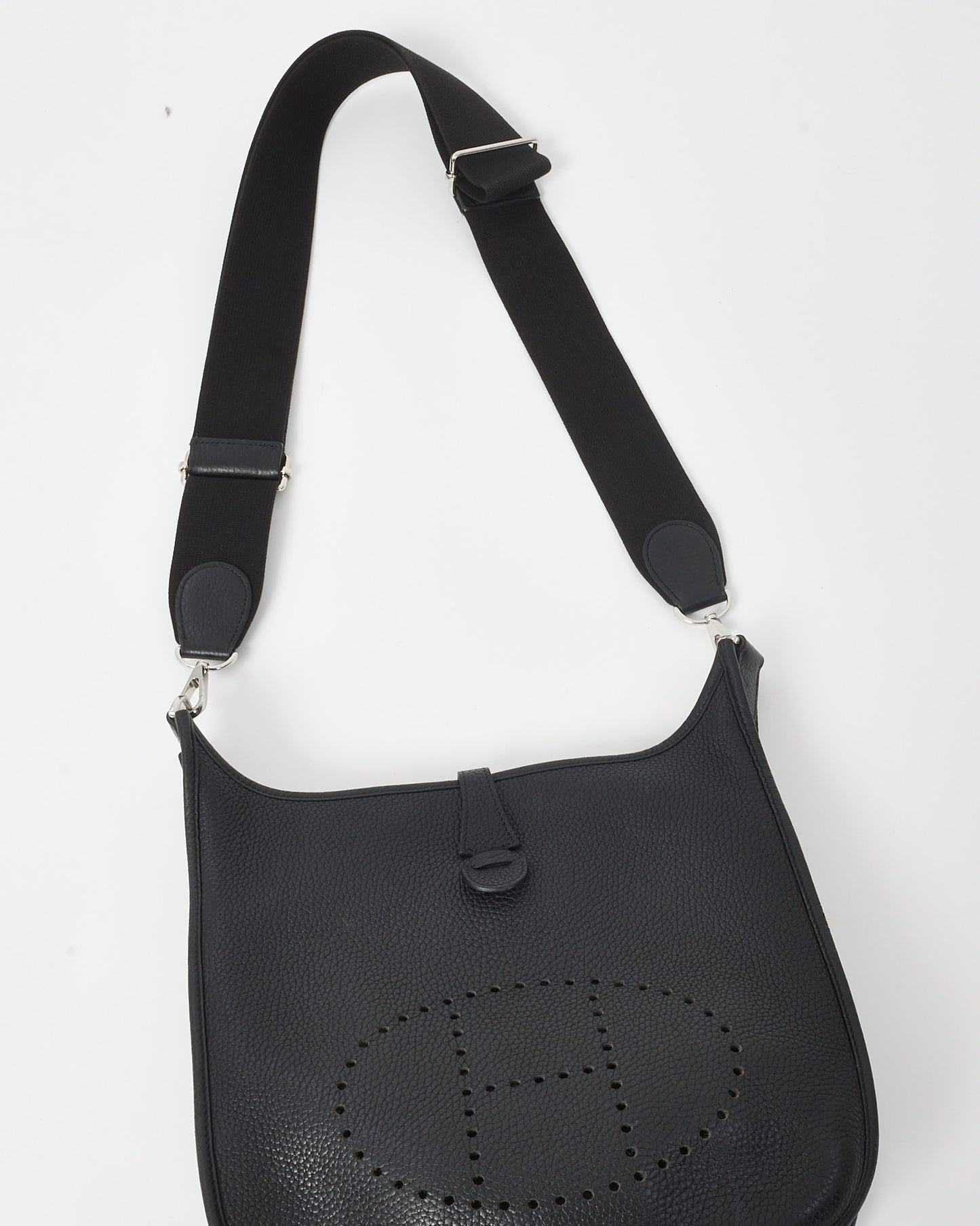 Hermes Black leather bag with a visible H brand logo on a white background
