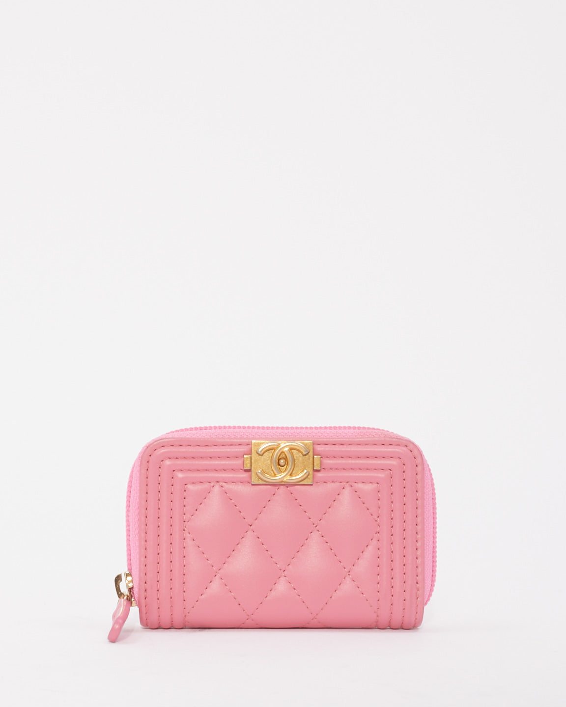 Explore a Chanel Pink Leather Boy Zip Around Coin Purse Wallet