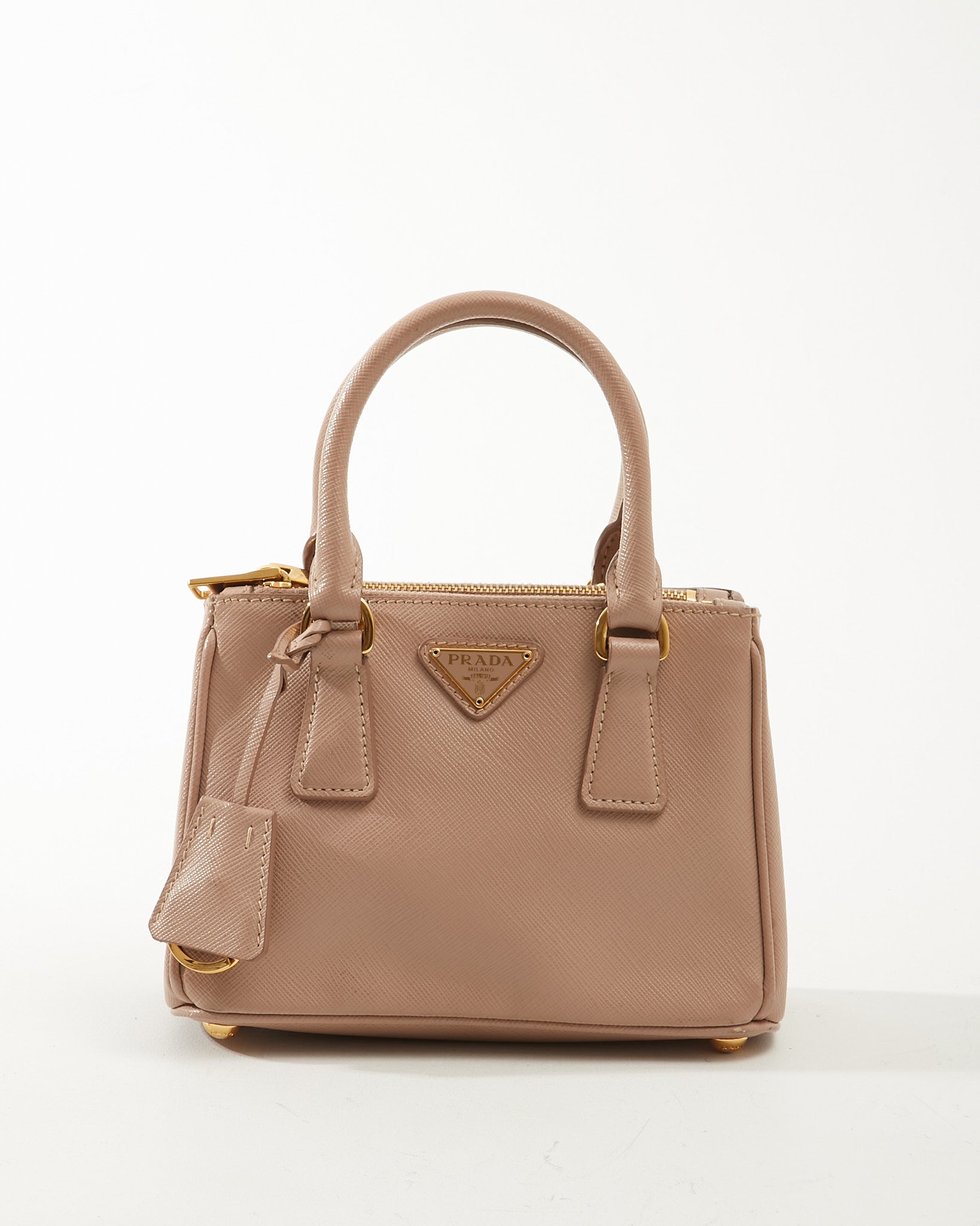 Explore a Prada Powder Pink Saffiano Leather Micro Galleria Bag
