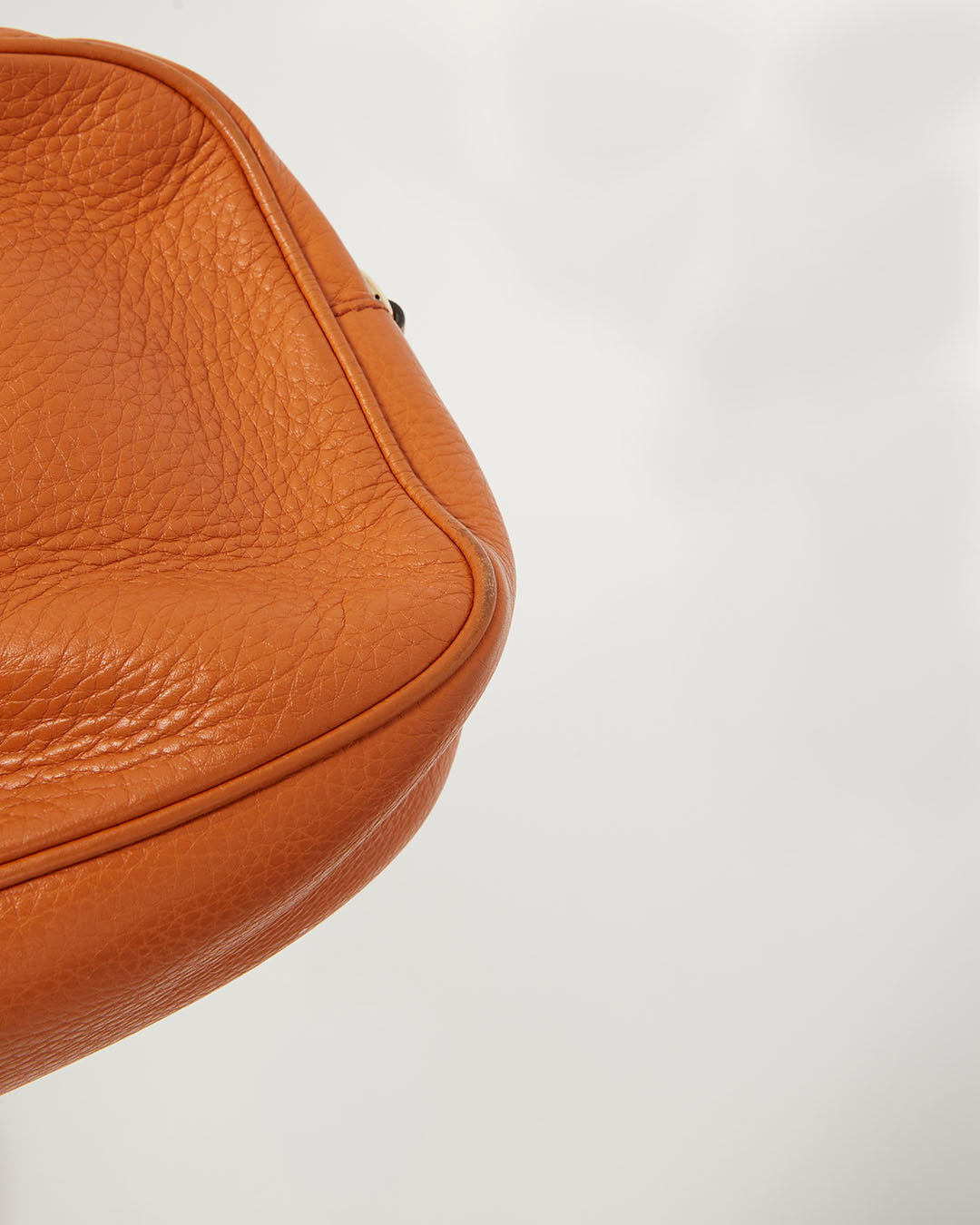 Gucci Burnt Orange Pebbled Leather Soho Disco Bag