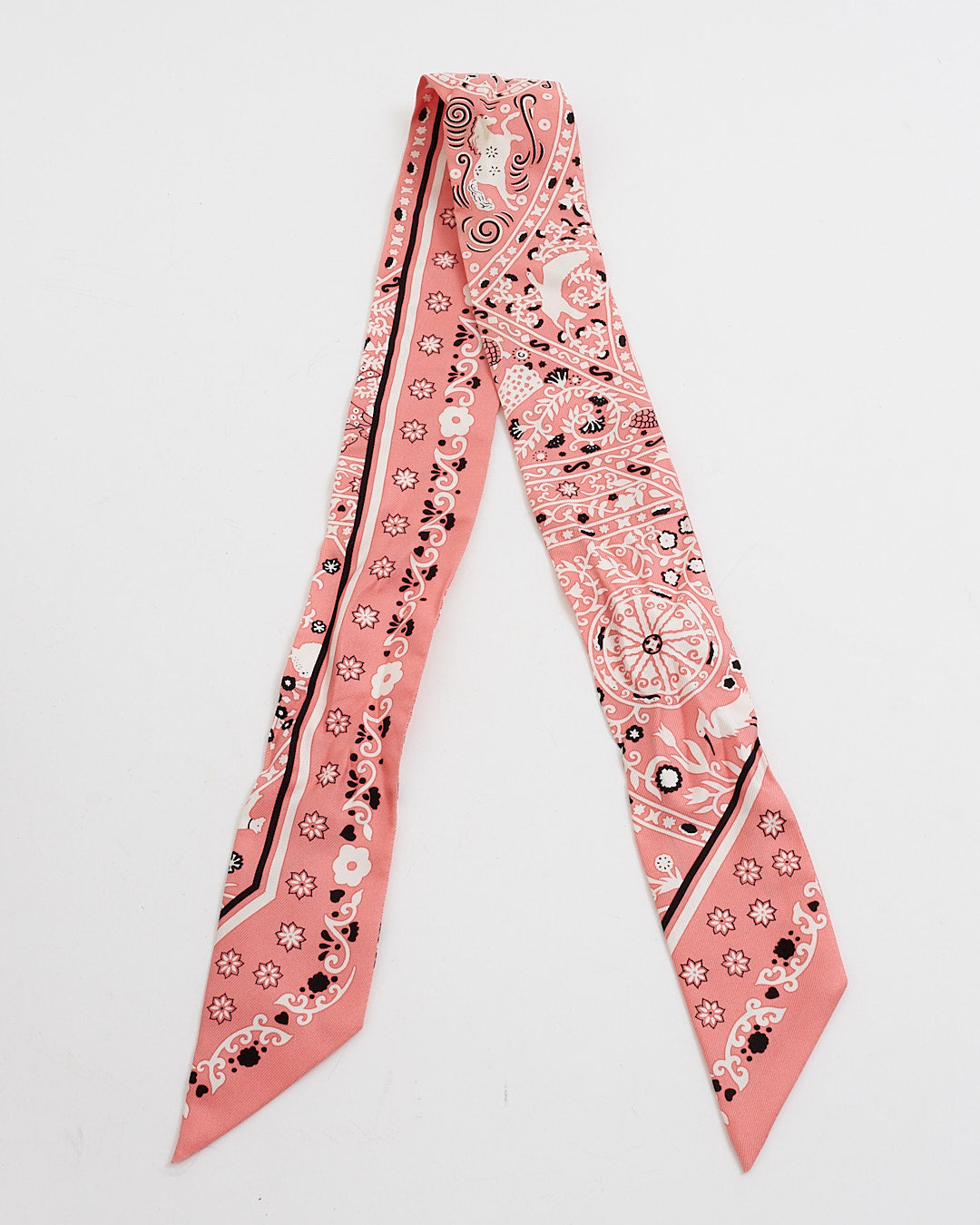 Explore a Hermès Pink/Black Floral/Animal Print Twilly Scarf