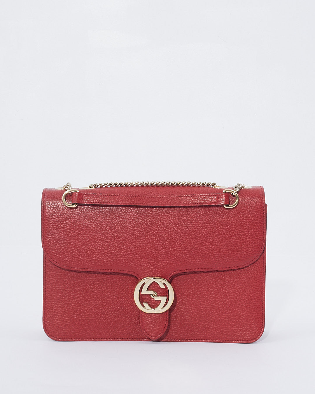 Explore a Gucci Red Pebbled Leather GG Interlocking Crossbody bag