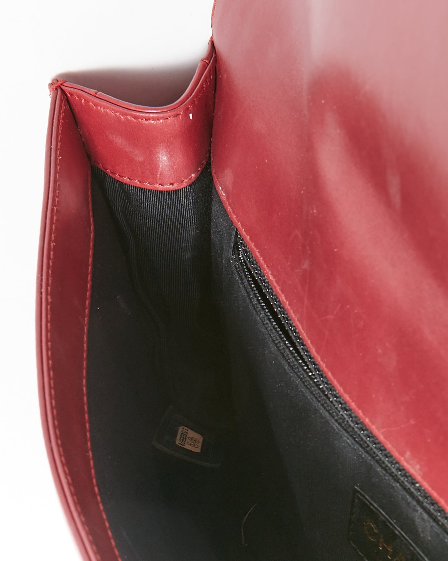 Pochette garçon en cuir d'agneau rouge vin Chanel