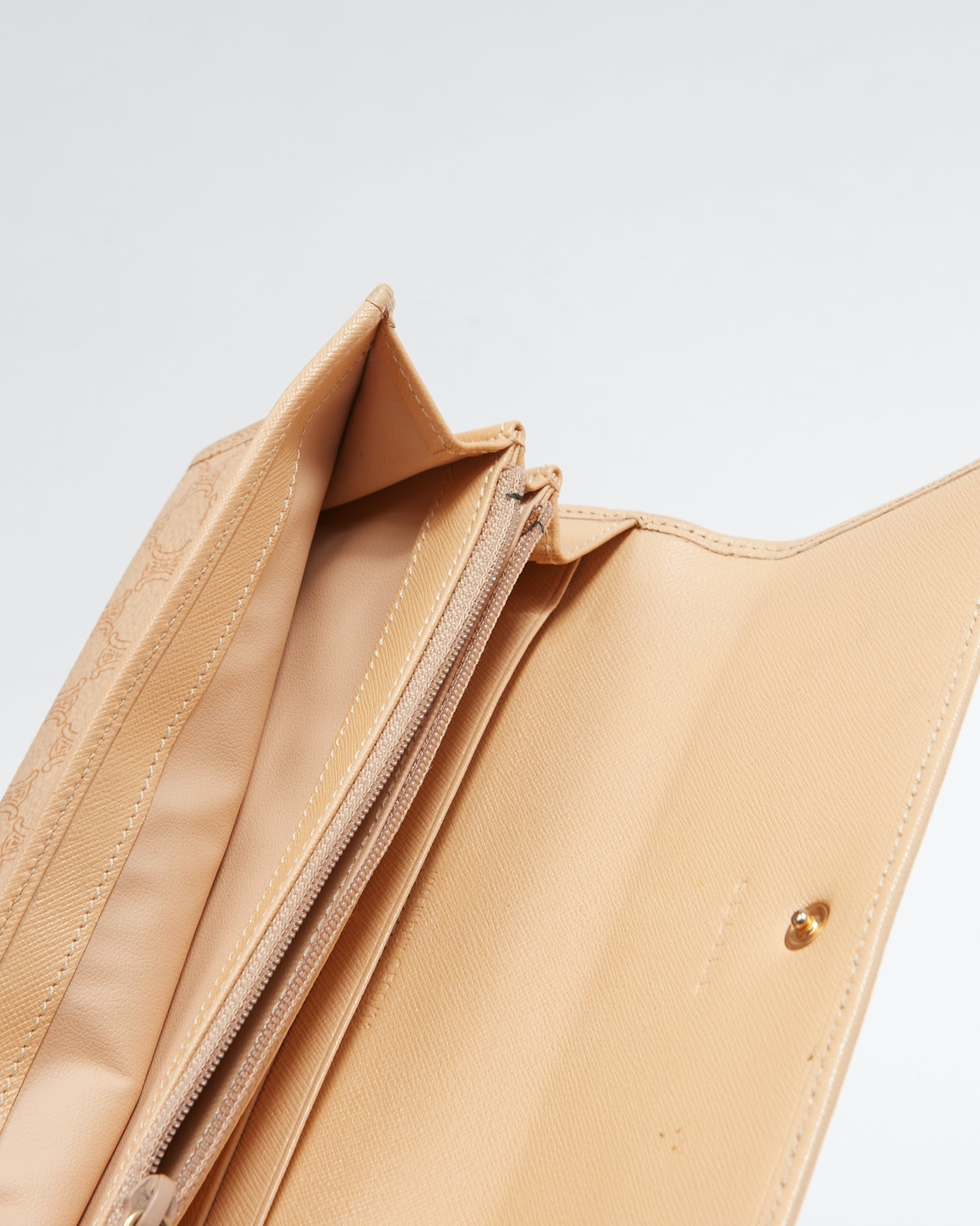 Portefeuille continental à rabat en toile enduite de macadam beige Celine