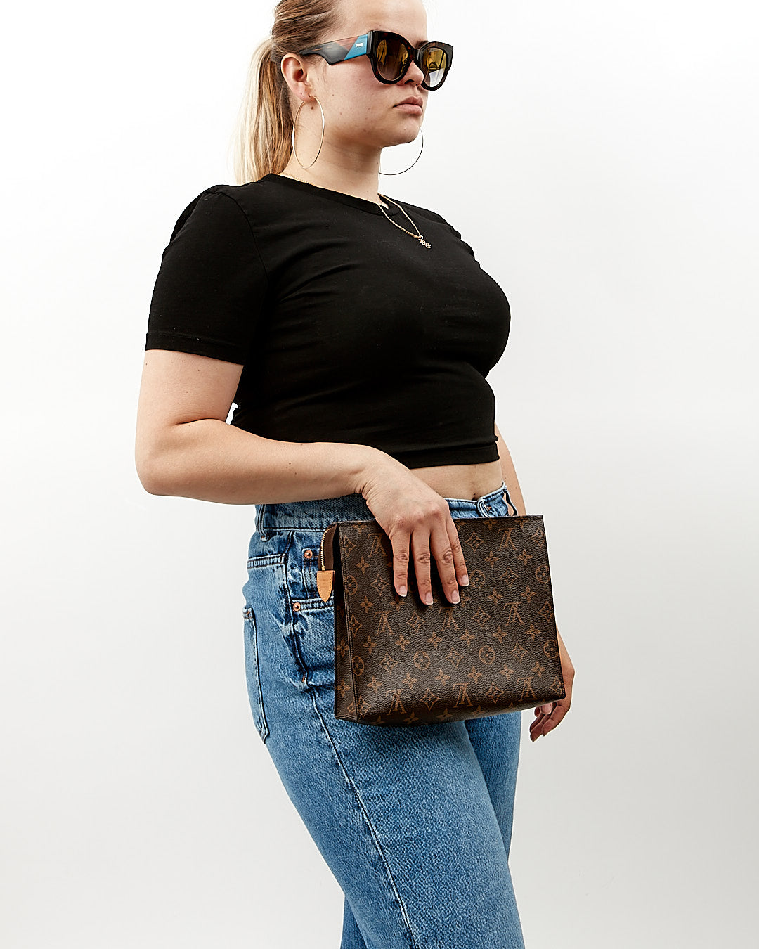 Pochette de toilette en toile monogram Louis Vuitton 26