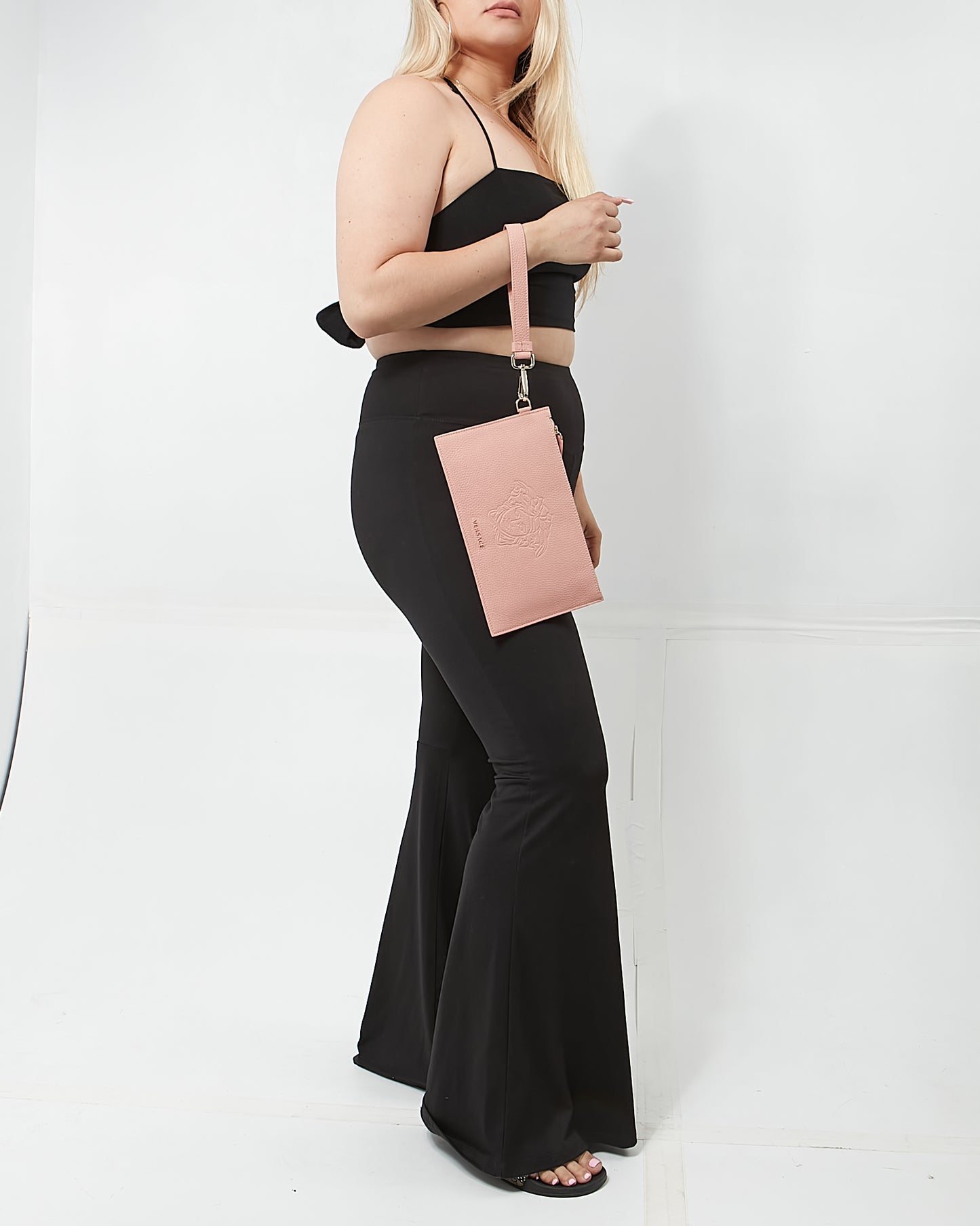 Pochette à bracelet tête de Medusa en cuir rose Versace