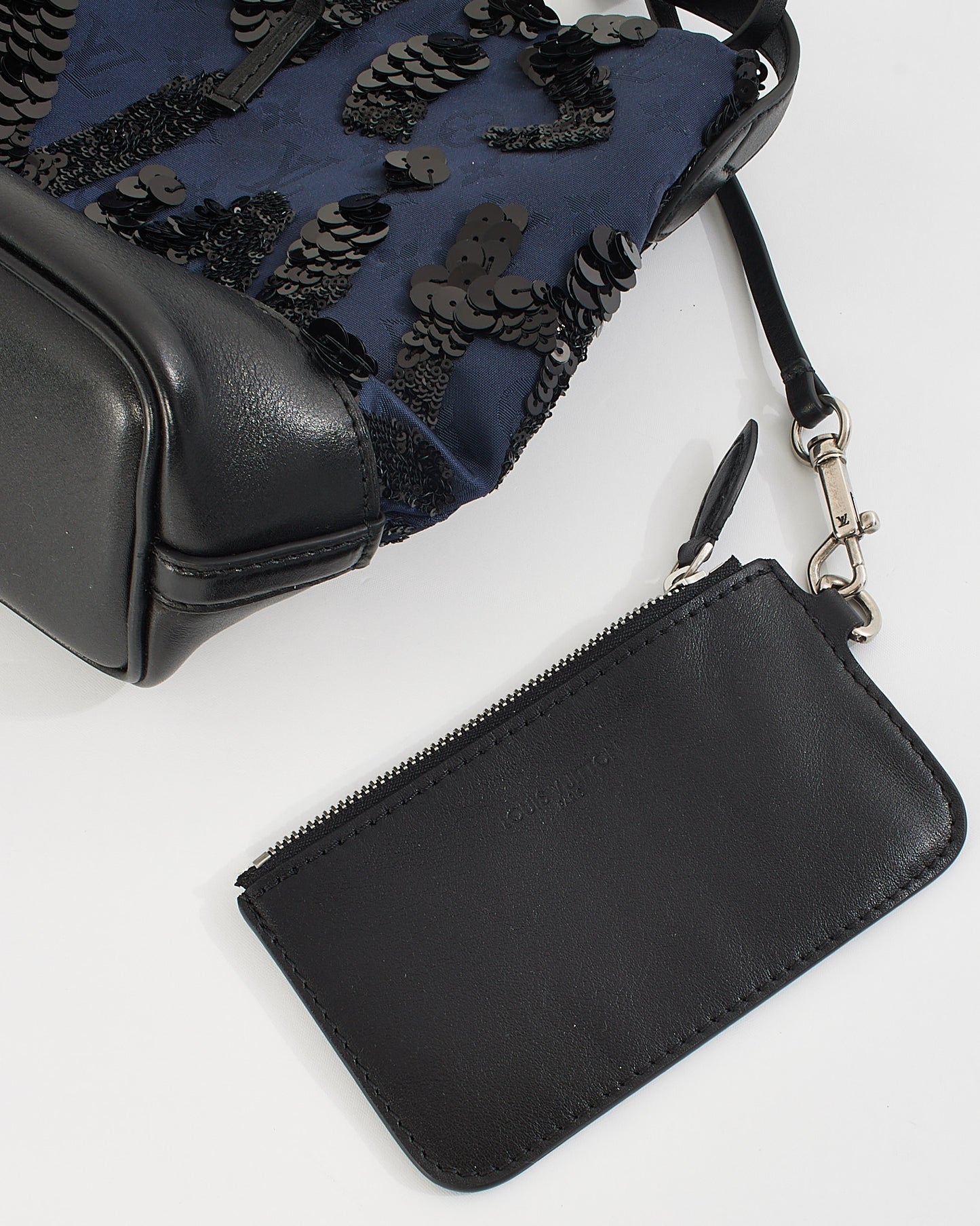 Louis Vuitton Sac à bandoulière Spotlight en satin monogramme bleu marine/noir