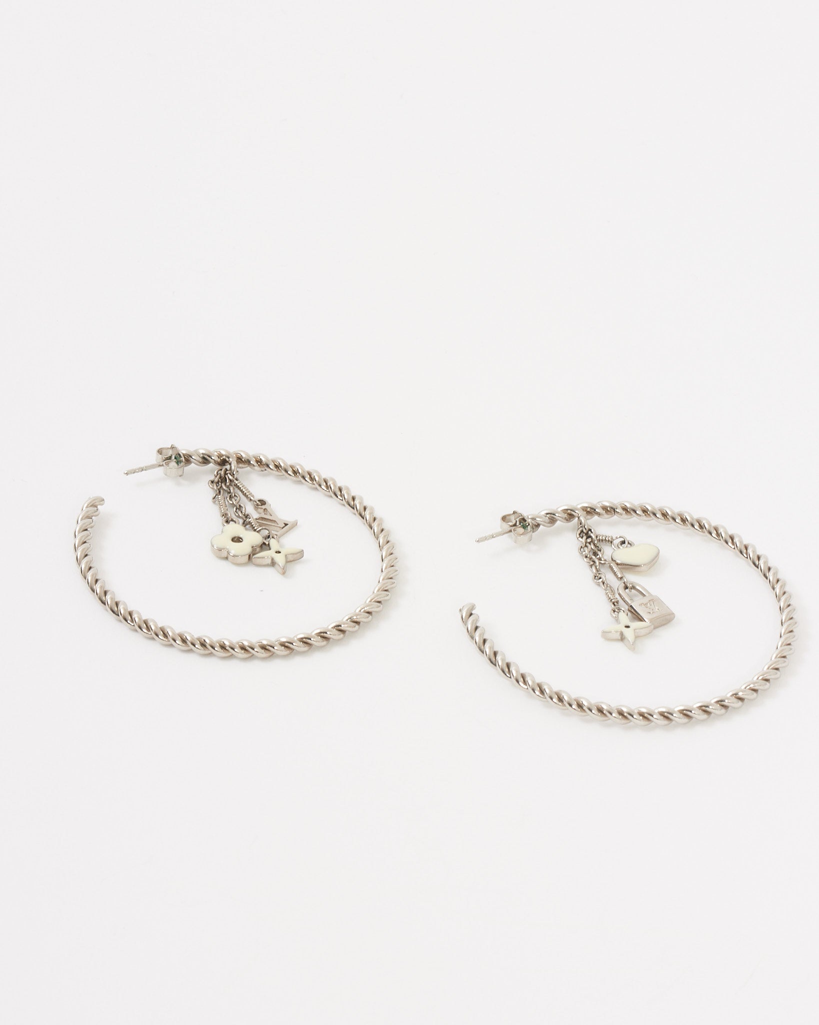 Explore a Louis Vuitton Silver Logo Monogram Hoop Earrings