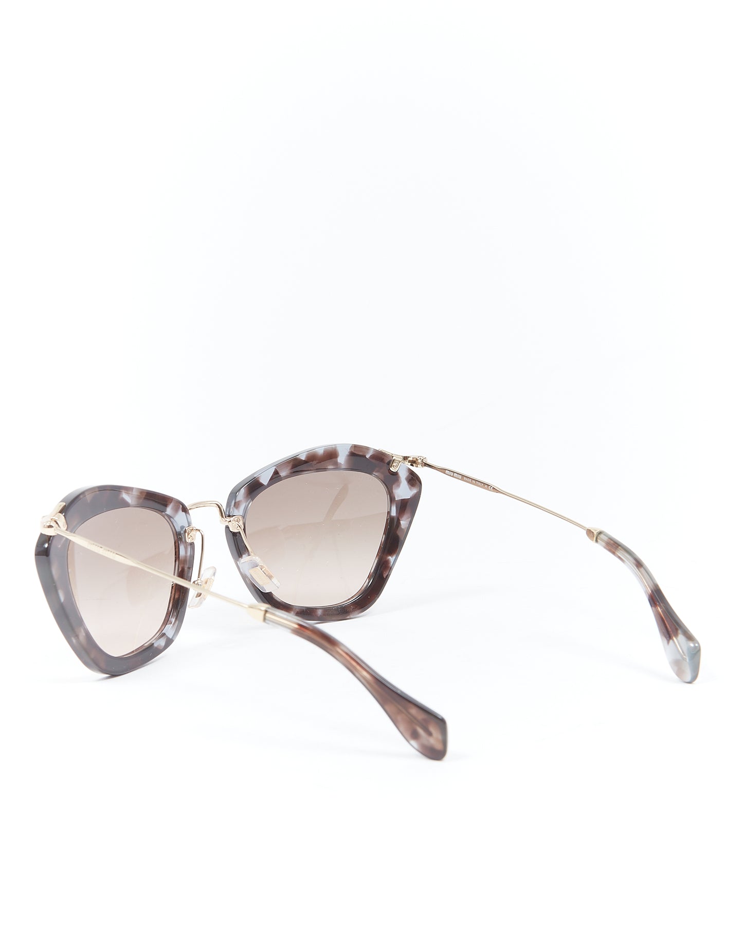 Lunettes de soleil Miu Miu œil de chat violet tortue SMU 10N