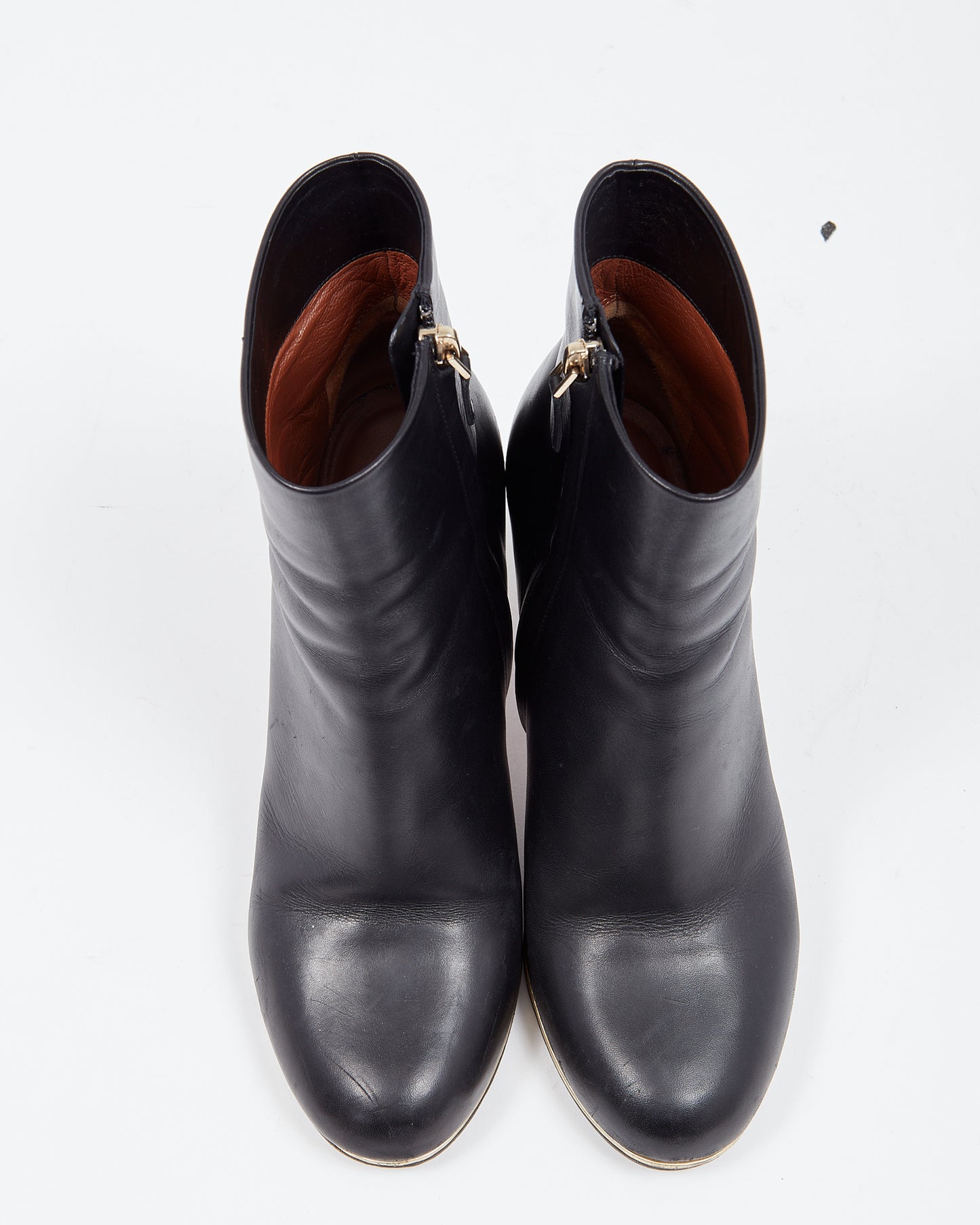 Givenchy Bottines à talons en cuir noir et bord doré - 38