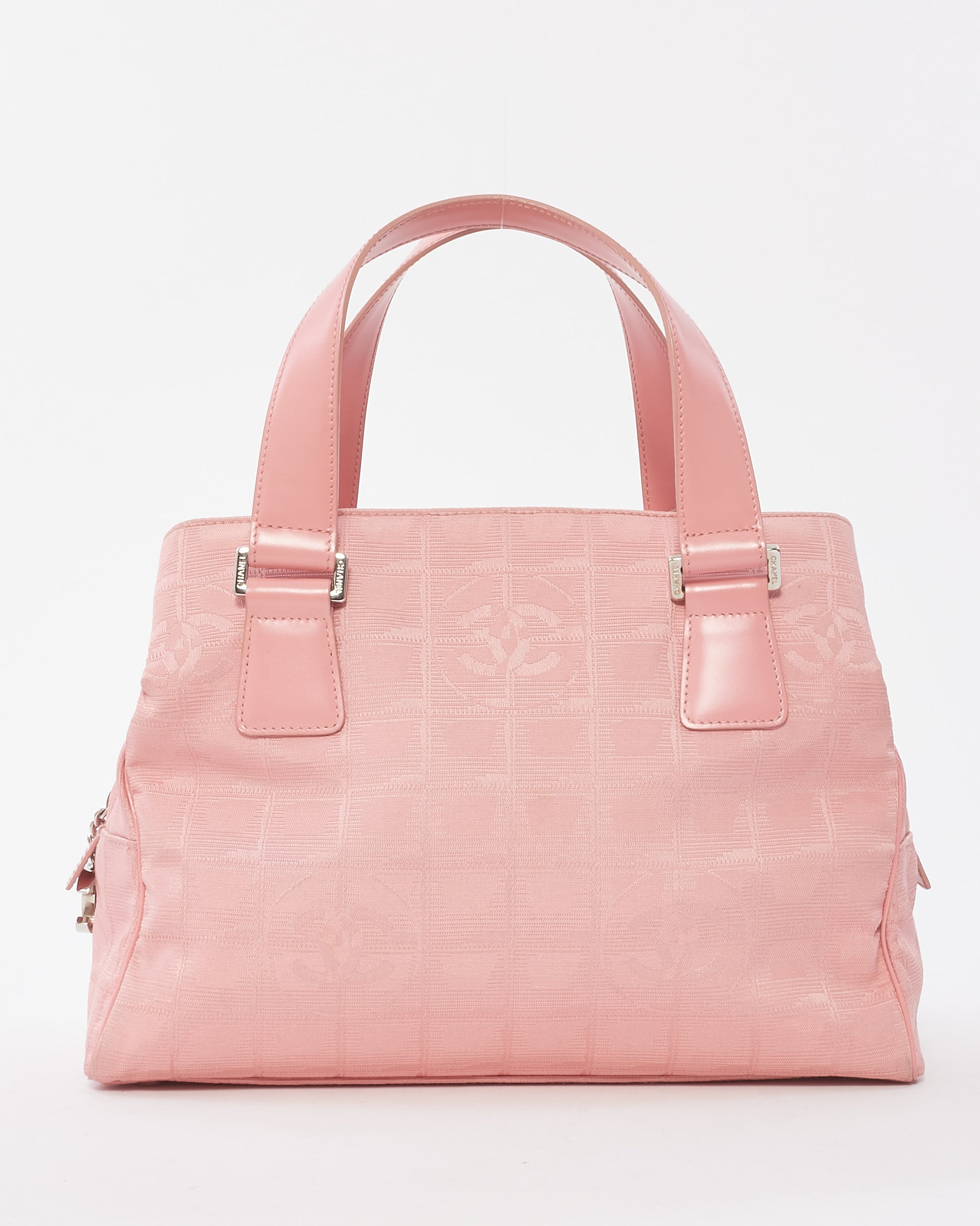 Explore a Chanel Vintage Pink New Line Canvas Logo Top Handle Bag