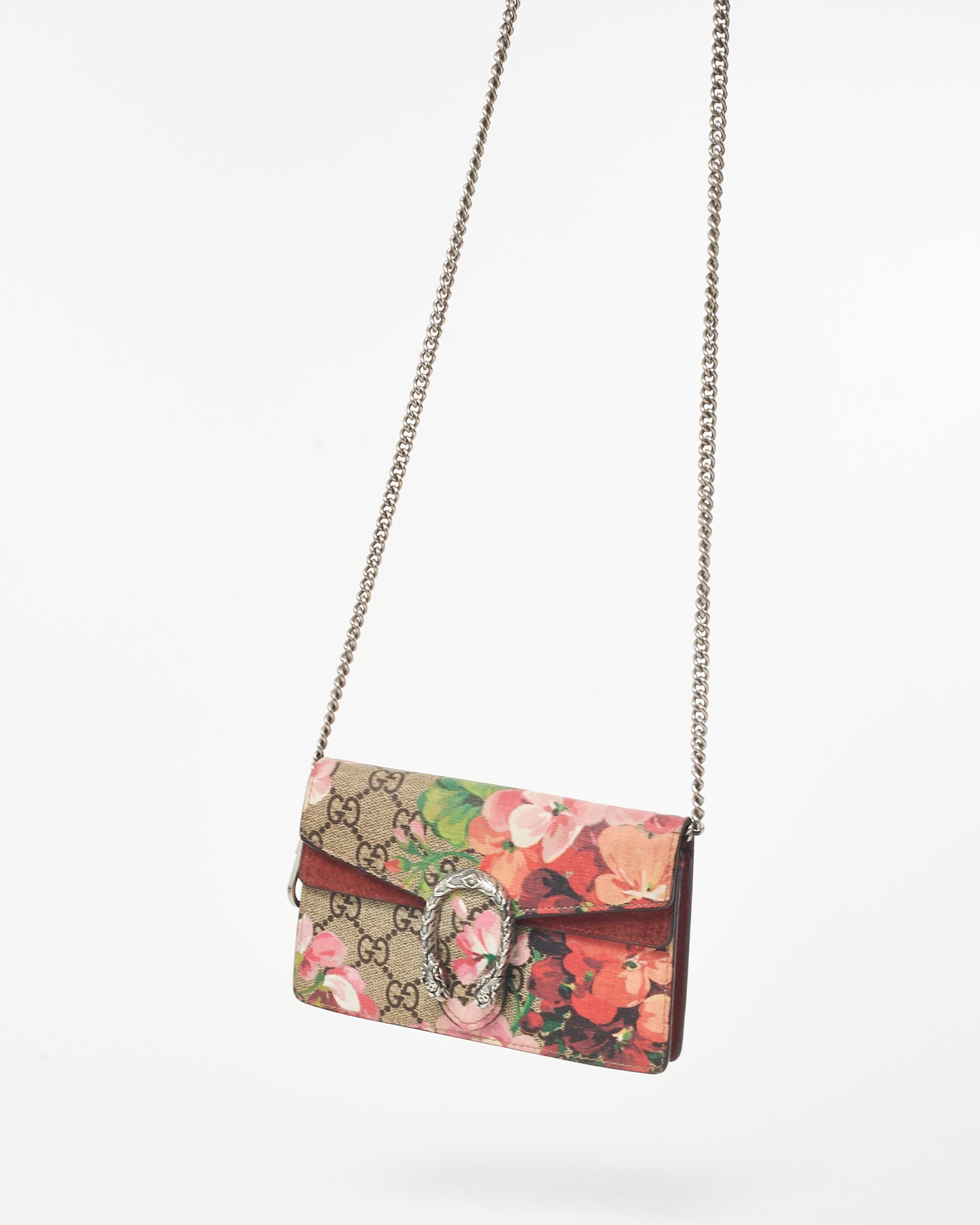 Pre-owned Gucci Dionysus mini bag featuring the GG Supreme canvas with a multicolor Blooms floral print, a silver-tone textured tiger head closure, a suede trim, and a structured silhouette front