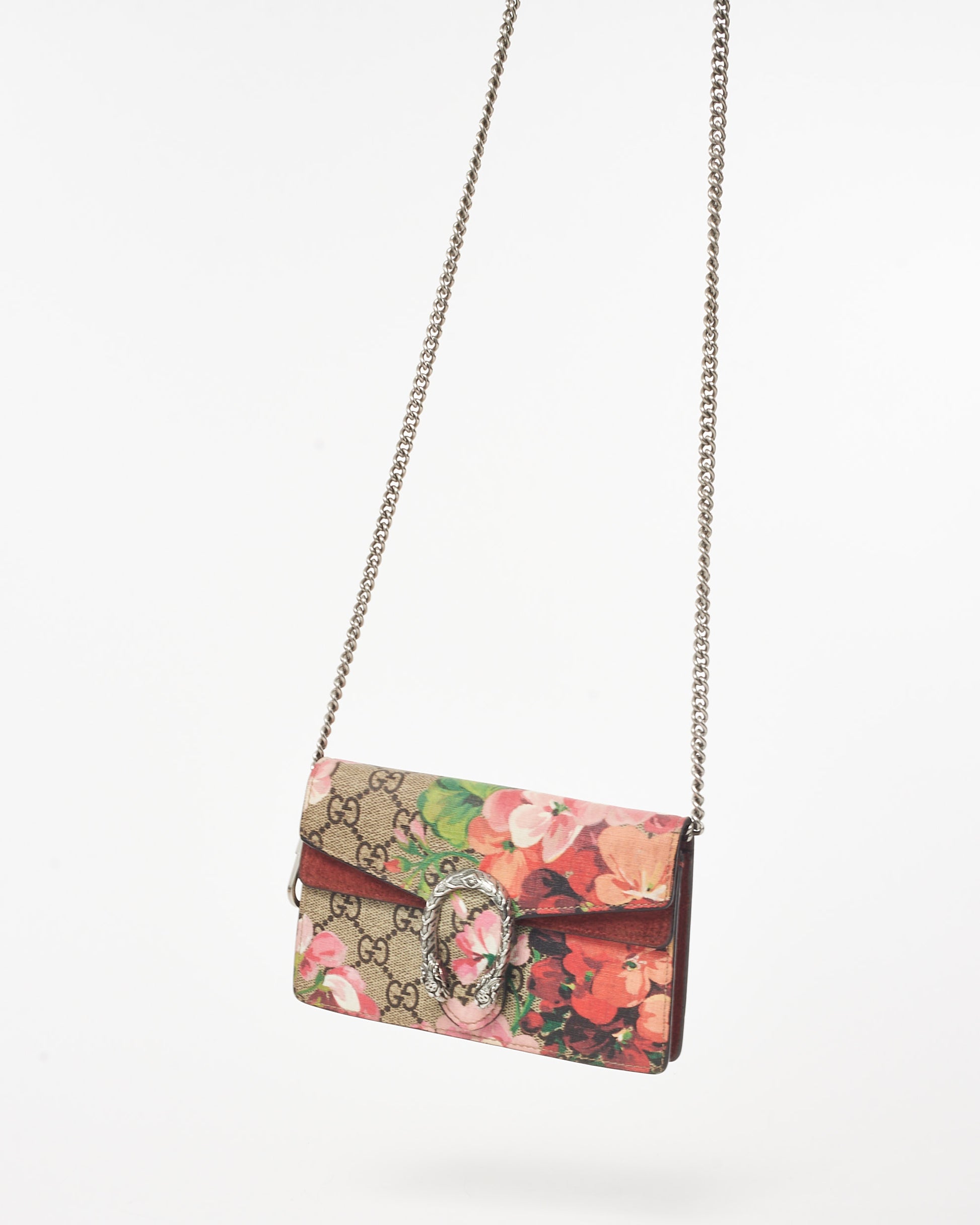 Pre-owned Gucci Dionysus mini bag featuring the GG Supreme canvas with a multicolor Blooms floral print, a silver-tone textured tiger head closure, a suede trim, and a structured silhouette front