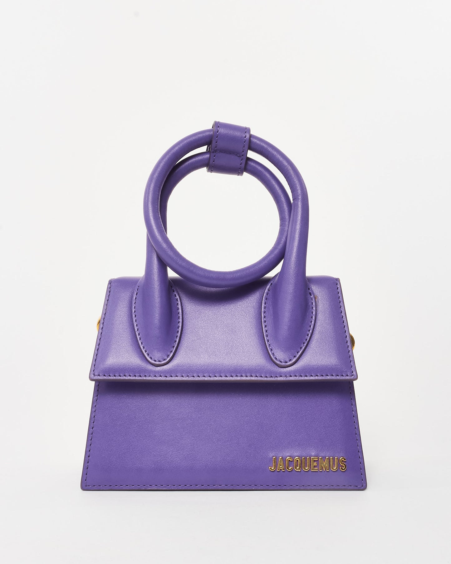 Pre-Owned Jacquemus Le Chiquito Noeud mini handbag in vibrant violet leather, featuring a structured trapezoidal silhouette, circular top handles, and gold-tone logo detailing on the front.