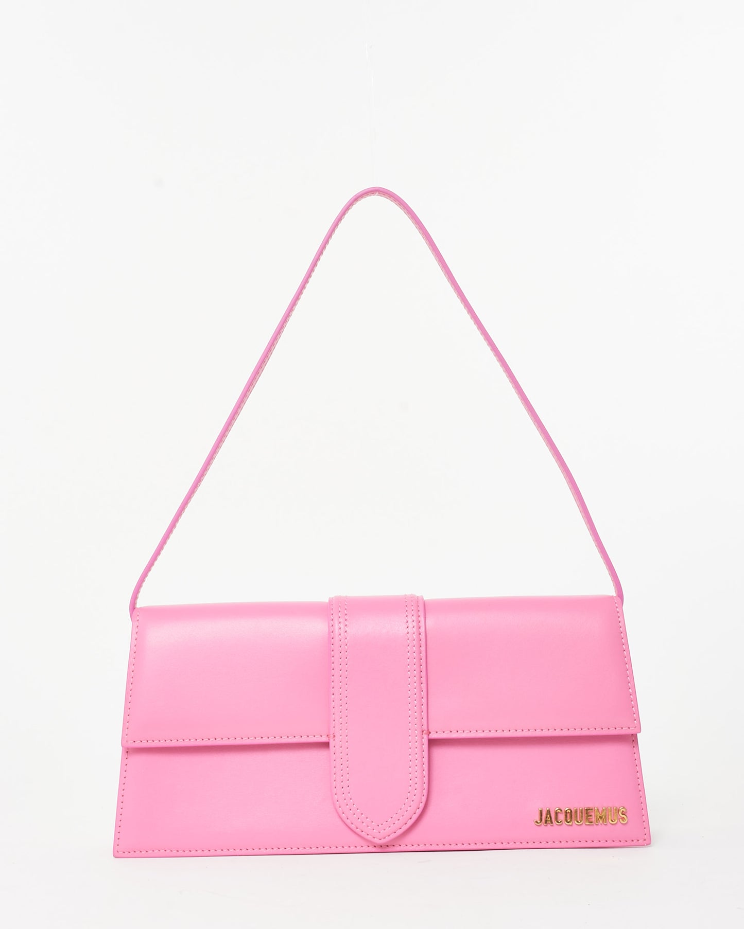 Pre-owned Jacquemus Le Bambino Long bag in soft pink leather, featuring a sleek rectangular silhouette, an extended front flap with tonal stitching, a thin shoulder strap, and gold-tone Jacquemus logo, front view
