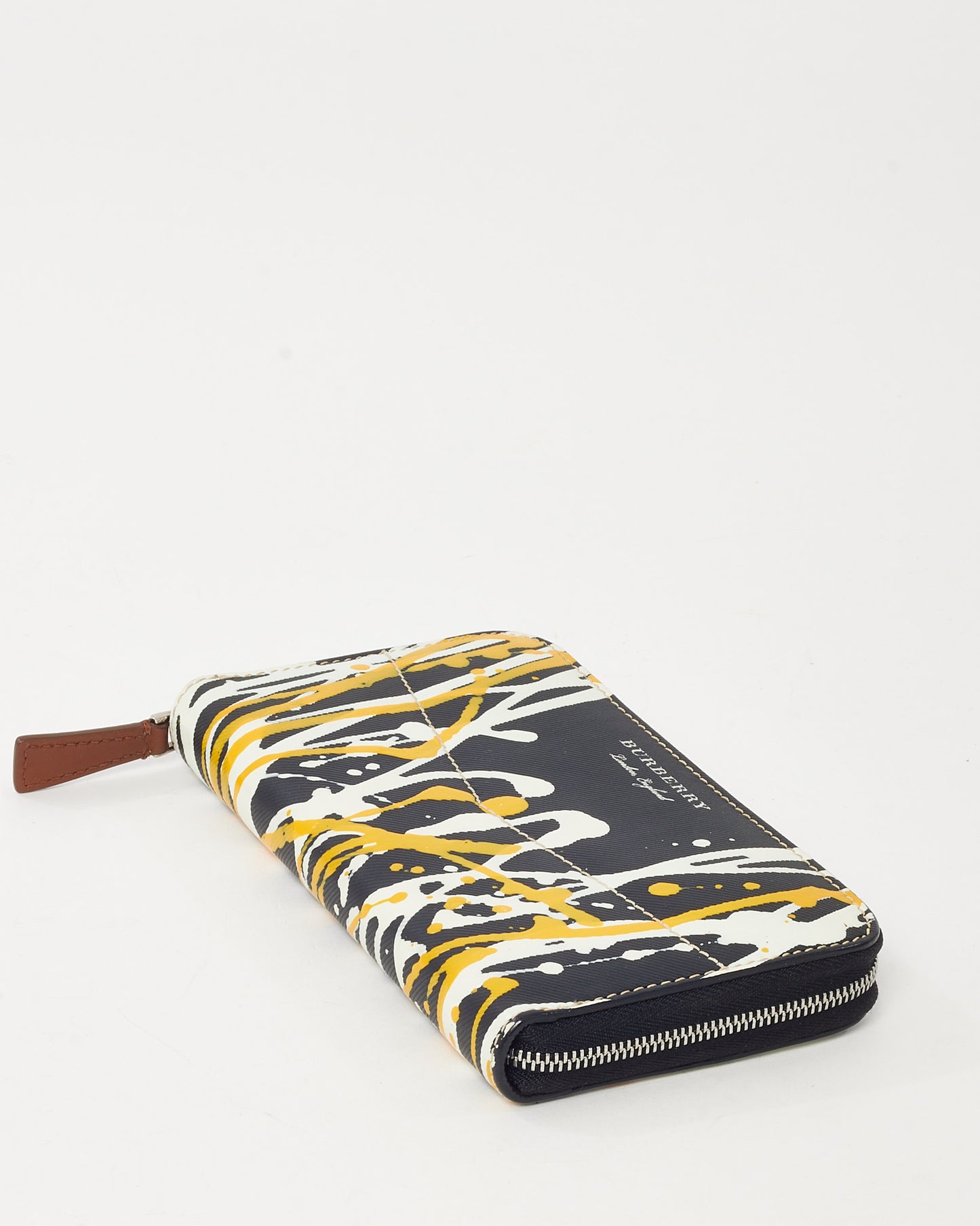 Portefeuille compact Burberry en cuir noir texturé avec logo doré