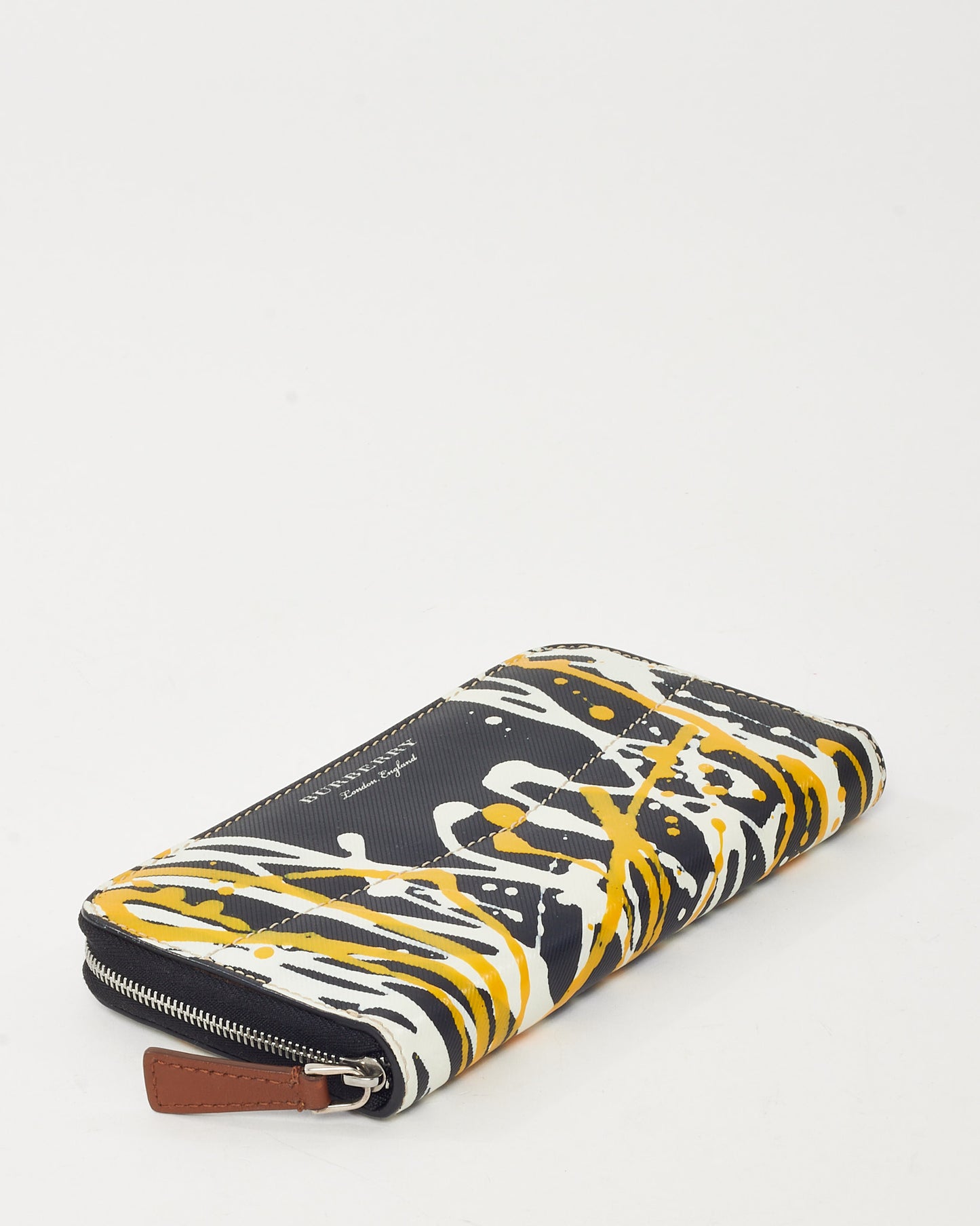 Portefeuille compact Burberry en cuir noir texturé avec logo doré
