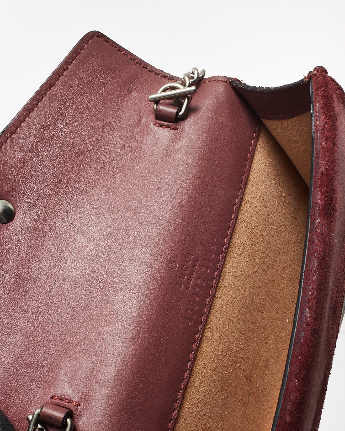 Pre-owned Gucci Dionysus mini bag featuring the GG Supreme canvas with a multicolor Blooms floral print, a silver-tone textured tiger head closure, a suede trim, and a structured silhouette inside view.