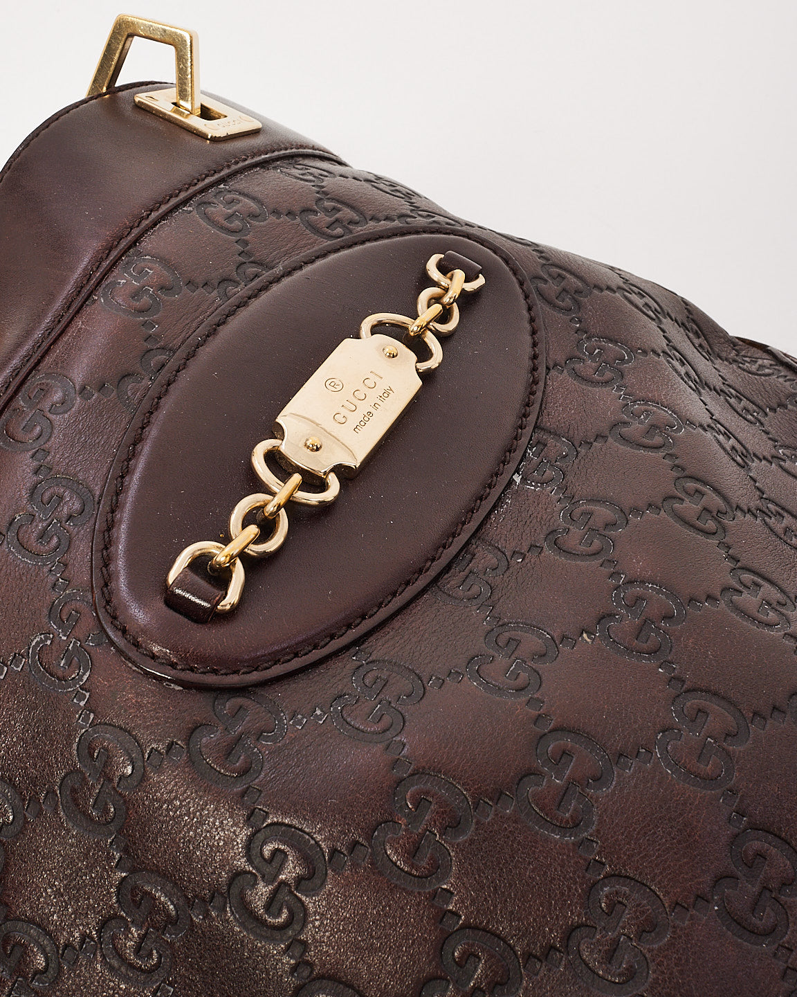 Petit fourre-tout punch en cuir gaufré Gucci Brown Signature G