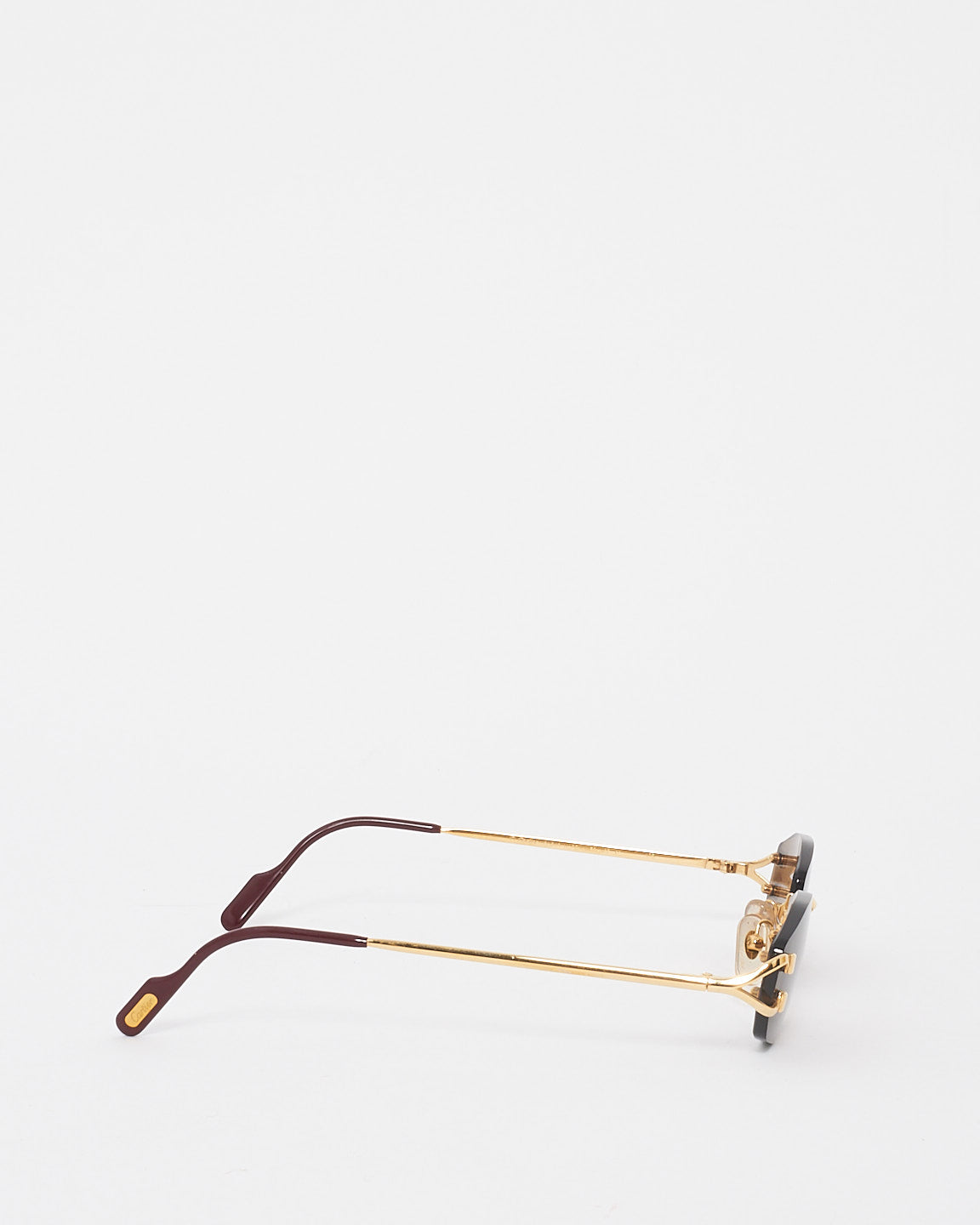 Cartier Petites lunettes de soleil sans monture à verres rectangulaires dorés et noirs