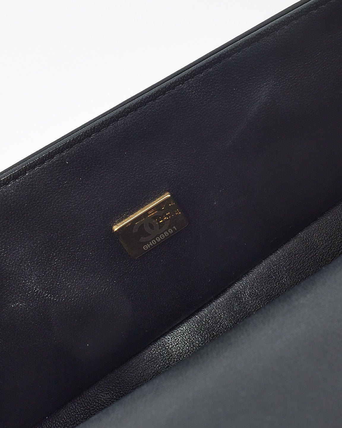 Sac petit garçon matelassé en cuir d'agneau noir Chanel GHW