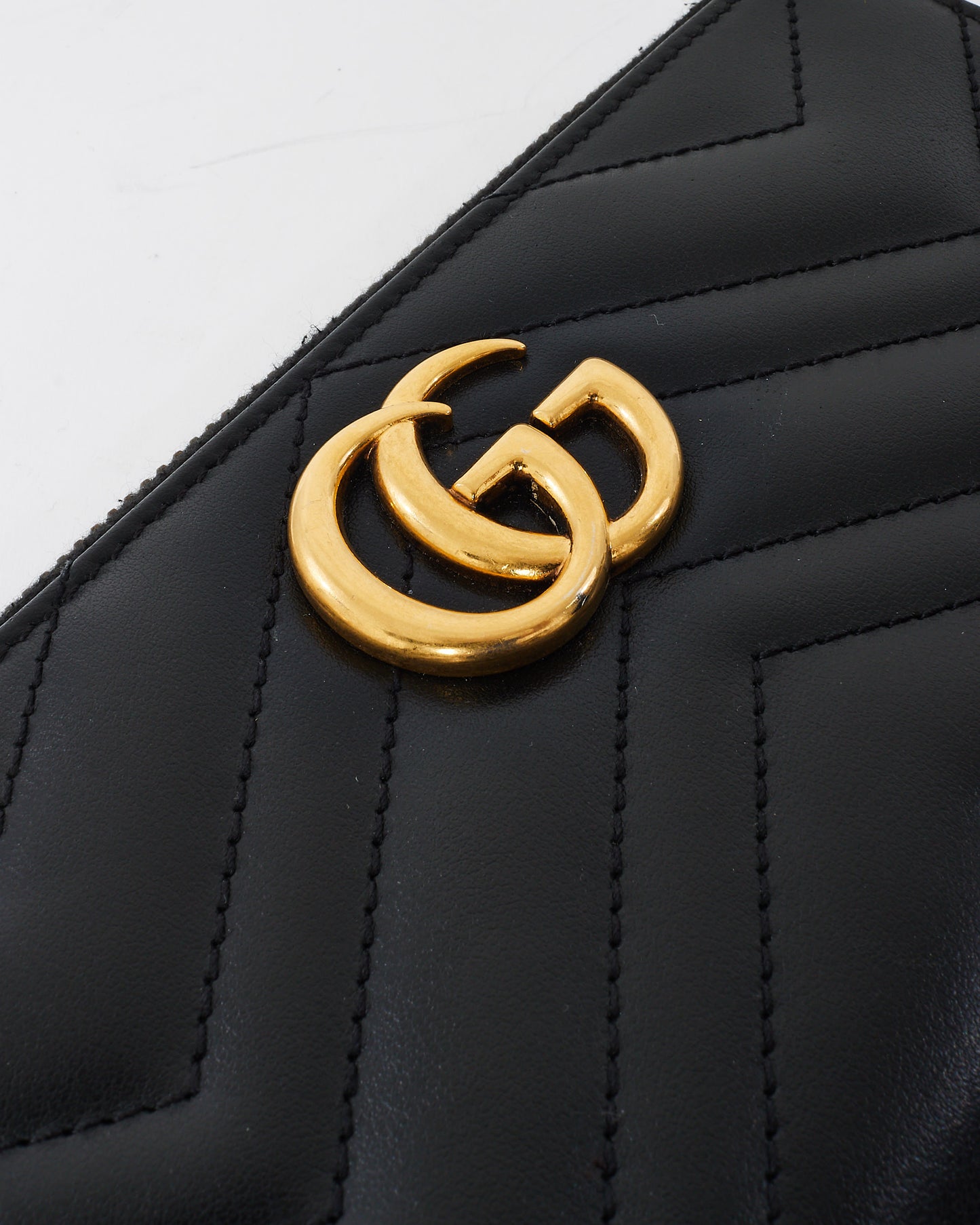 Portefeuille zippé GG Marmont en cuir Matlasseé noir Gucci