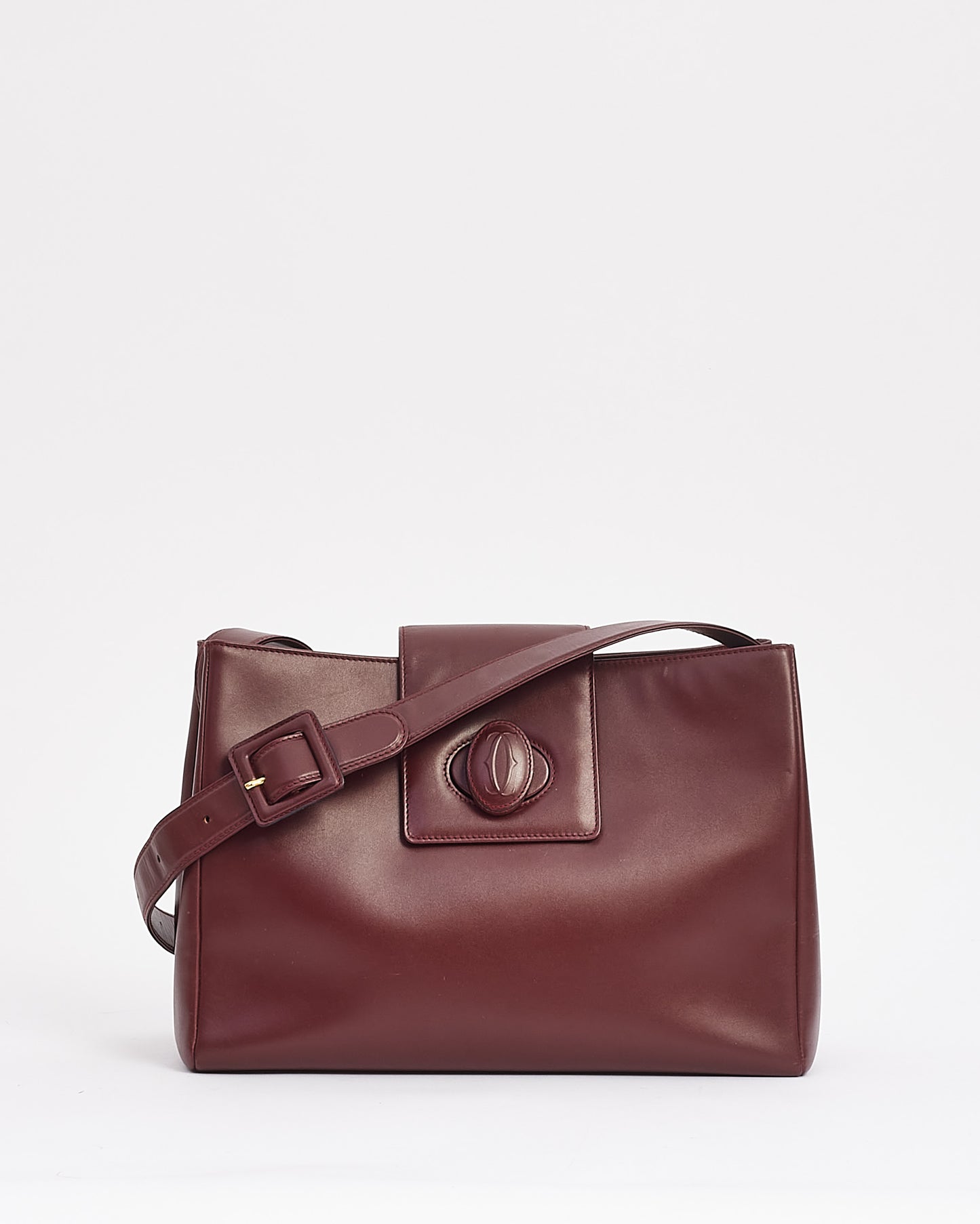Explore a Cartier Burgundy Leather Must De Cartier Crossbody Bag