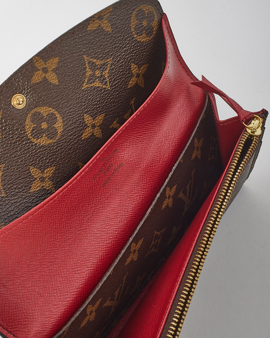 Portefeuille Emilie en toile monogram rouge Louis Vuitton