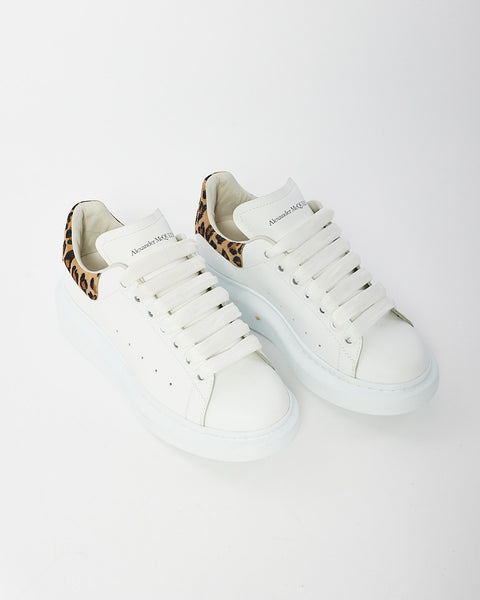 Explore a Alexander McQueen White Leopard Oversized Sneaker