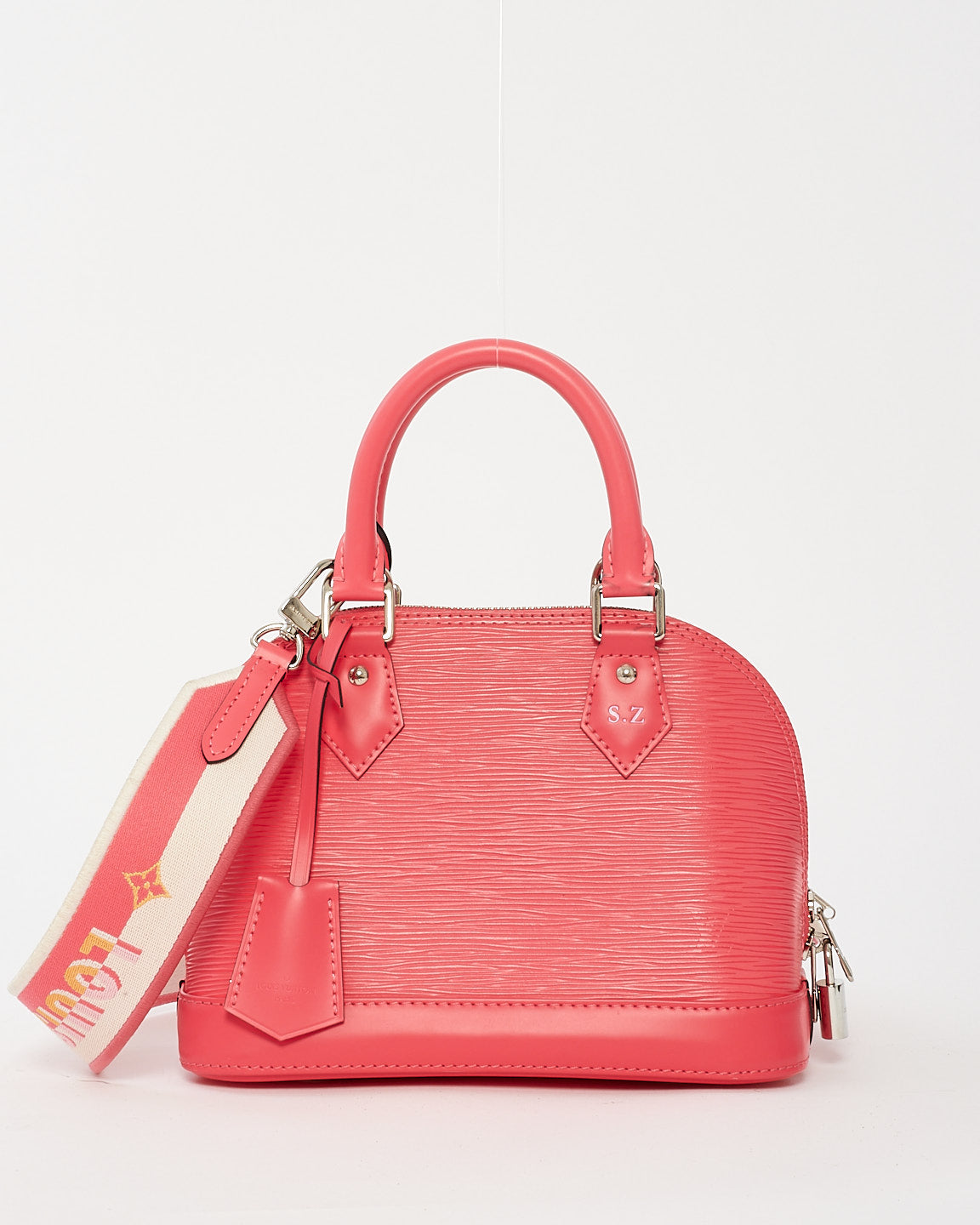 Louis Vuitton Alma BB en cuir épi rose avec bracelet en toile