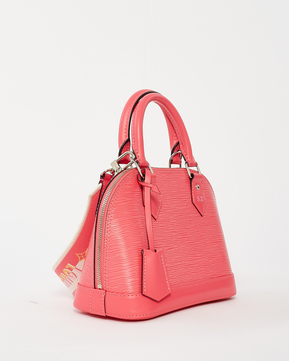 Louis Vuitton Alma BB en cuir épi rose avec bracelet en toile