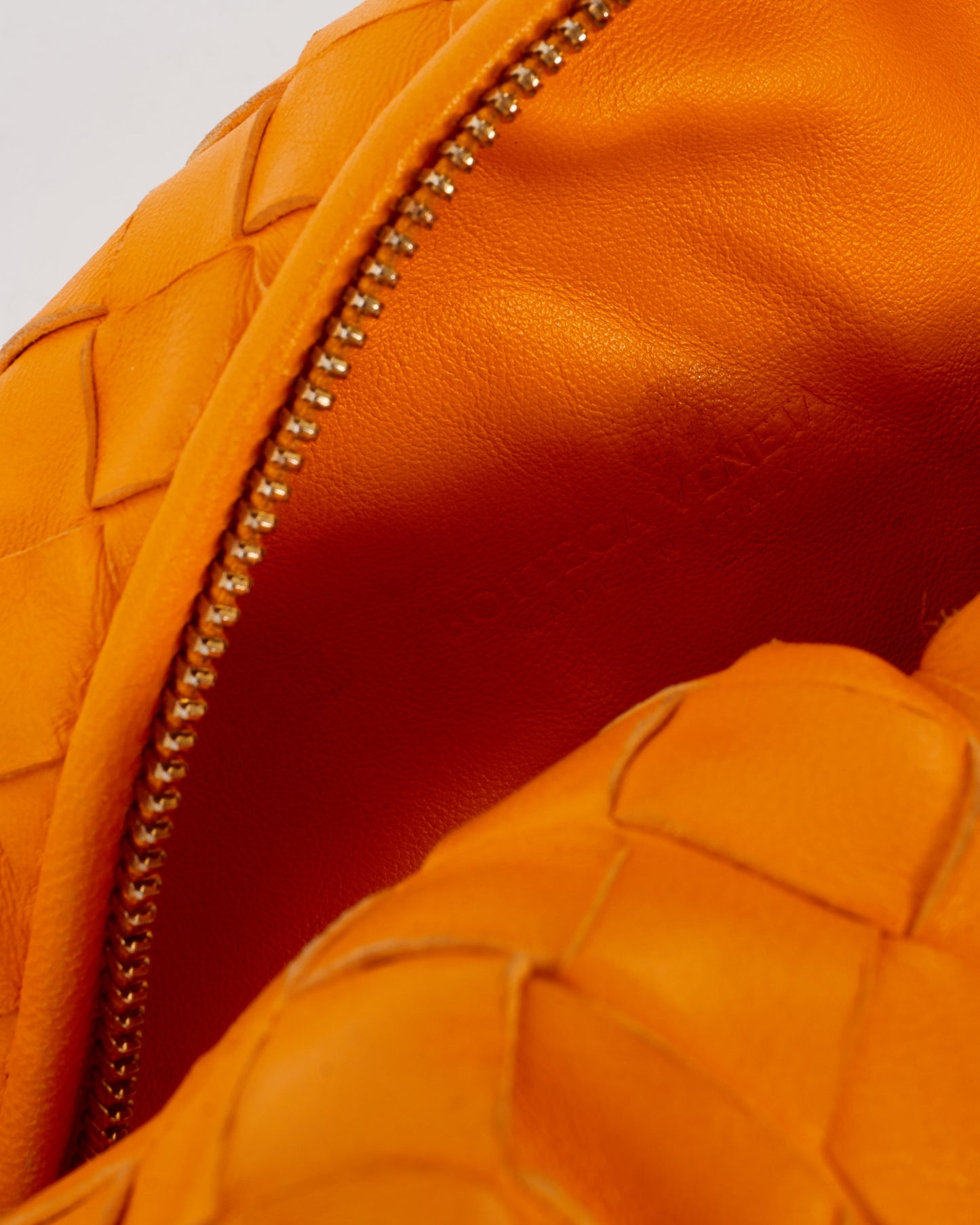 Bottega Veneta Orange Intrecciato Leather Teen Jodie Bag