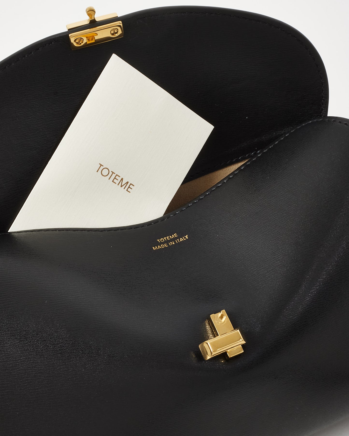 Totême Black Leather T-Lock Clutch Bag w/ Strap