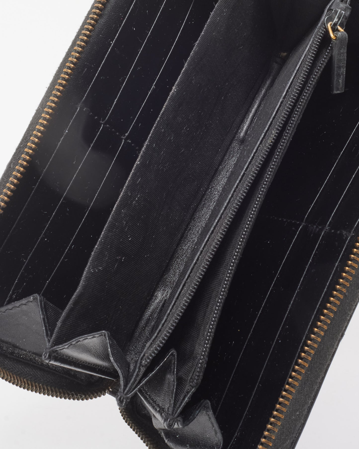 Portefeuille zippé GG Marmont en cuir Matlasseé noir Gucci