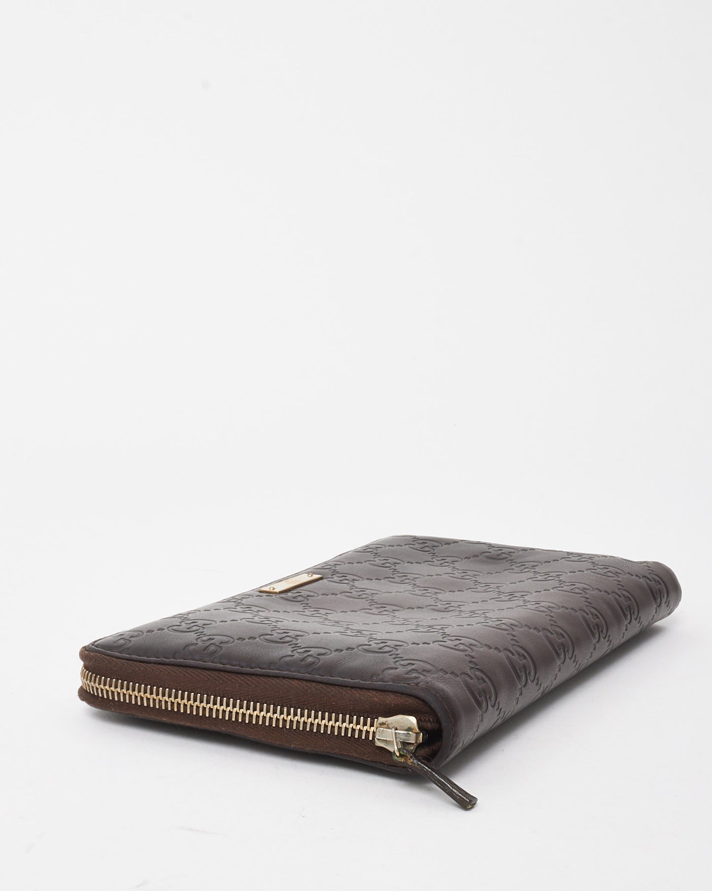 Gucci Brown Signature GG Embossed Leather Zippy Wallet
