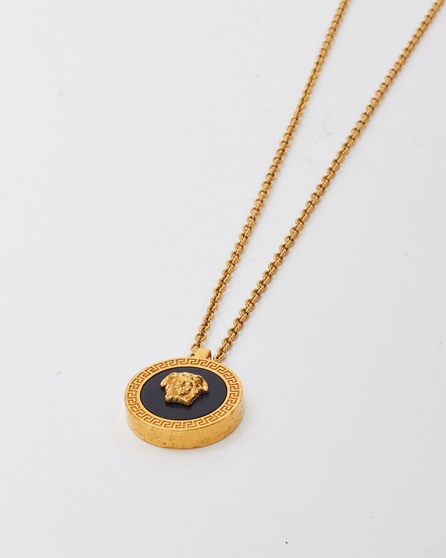 Versace Gold Metal and Black Medusa Head Circle Pendant Necklace