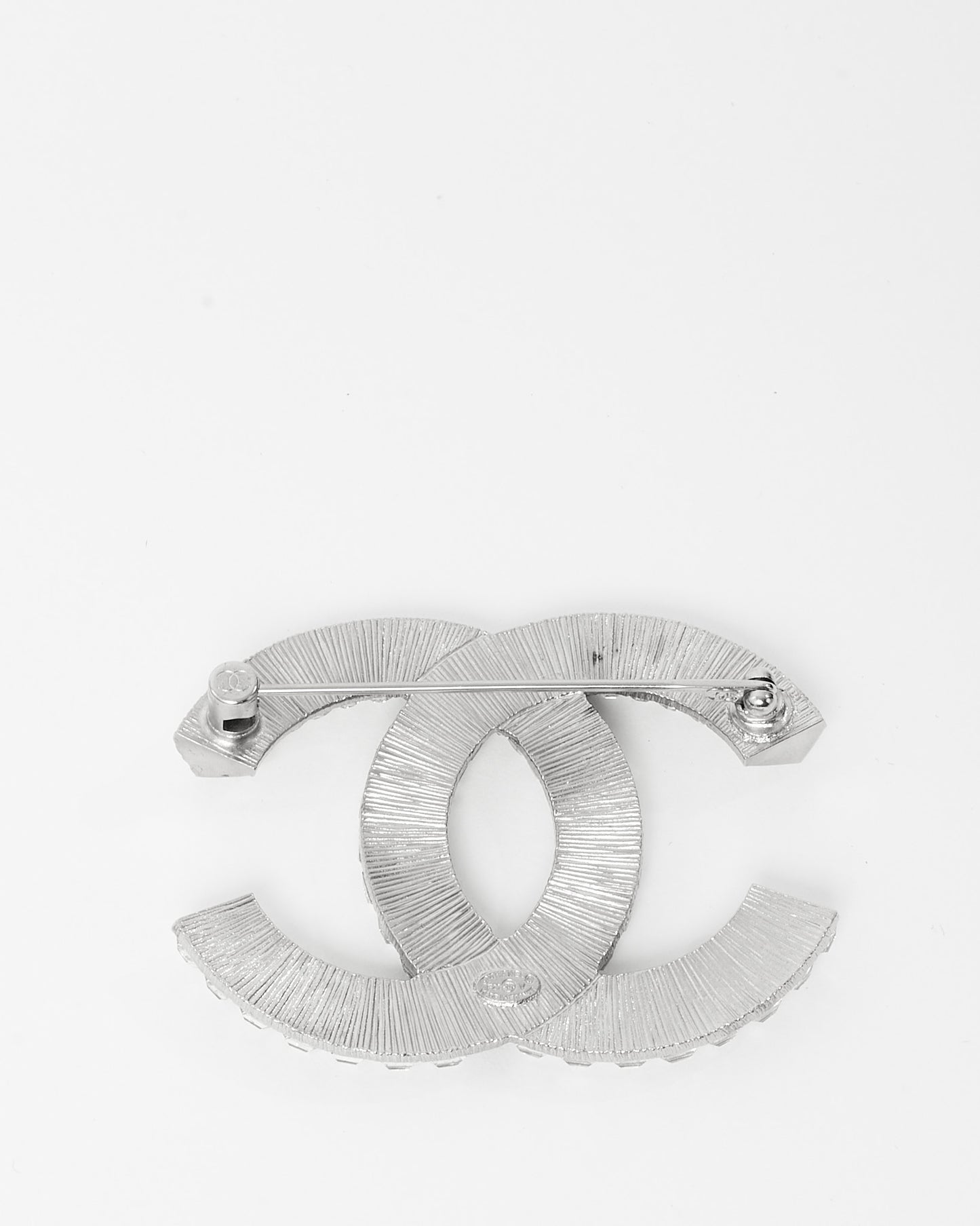 Broche Chanel en cristal et baguette argentés