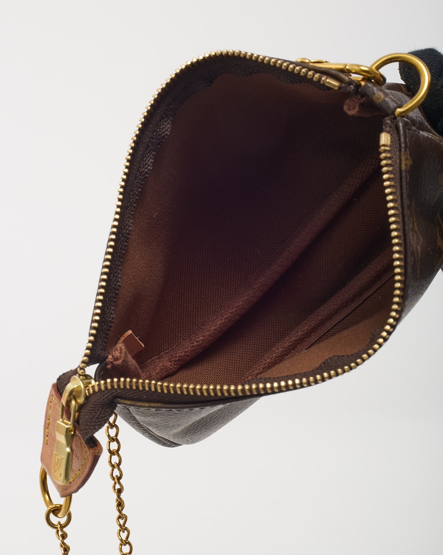 Mini Pochette Accessoires en toile Monogram Louis Vuitton
