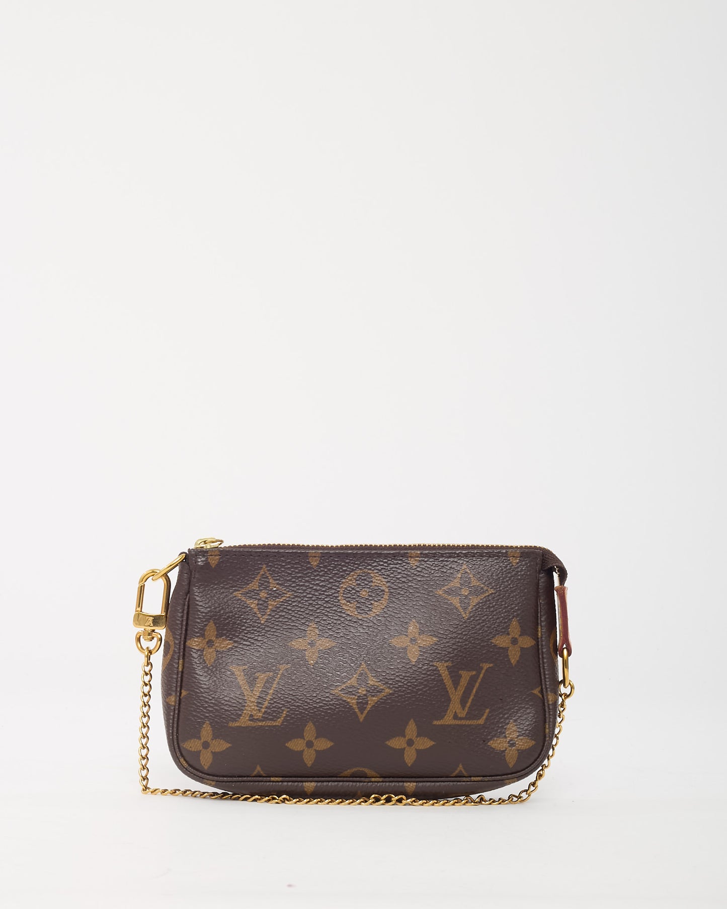 Mini Pochette Accessoires en toile Monogram Louis Vuitton