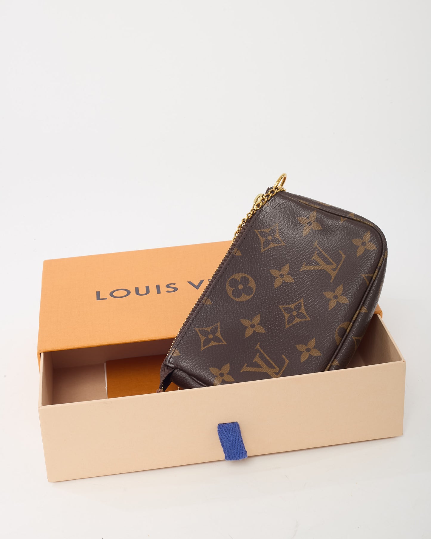 Mini Pochette Accessoires en toile Monogram Louis Vuitton