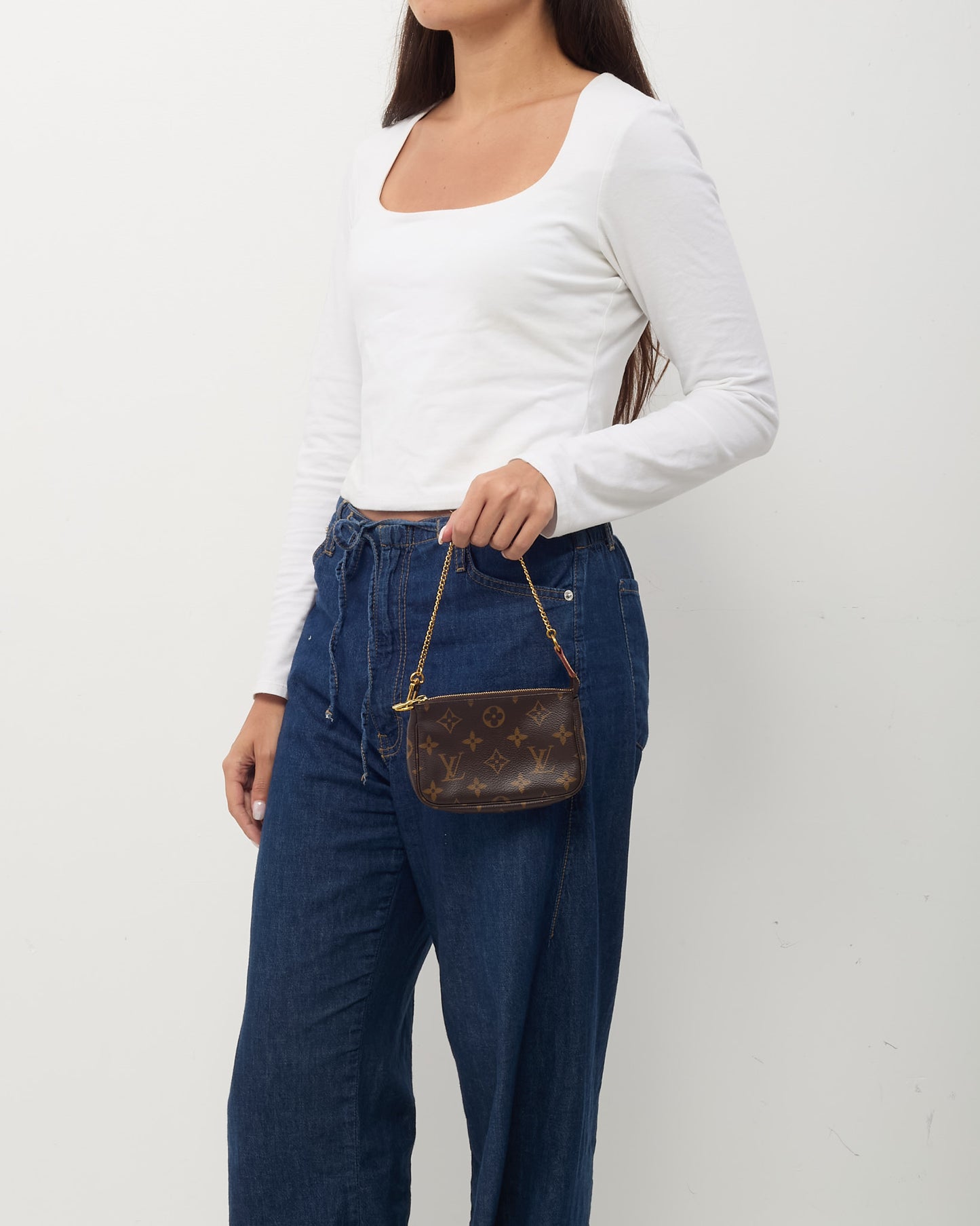 Mini Pochette Accessoires en toile Monogram Louis Vuitton