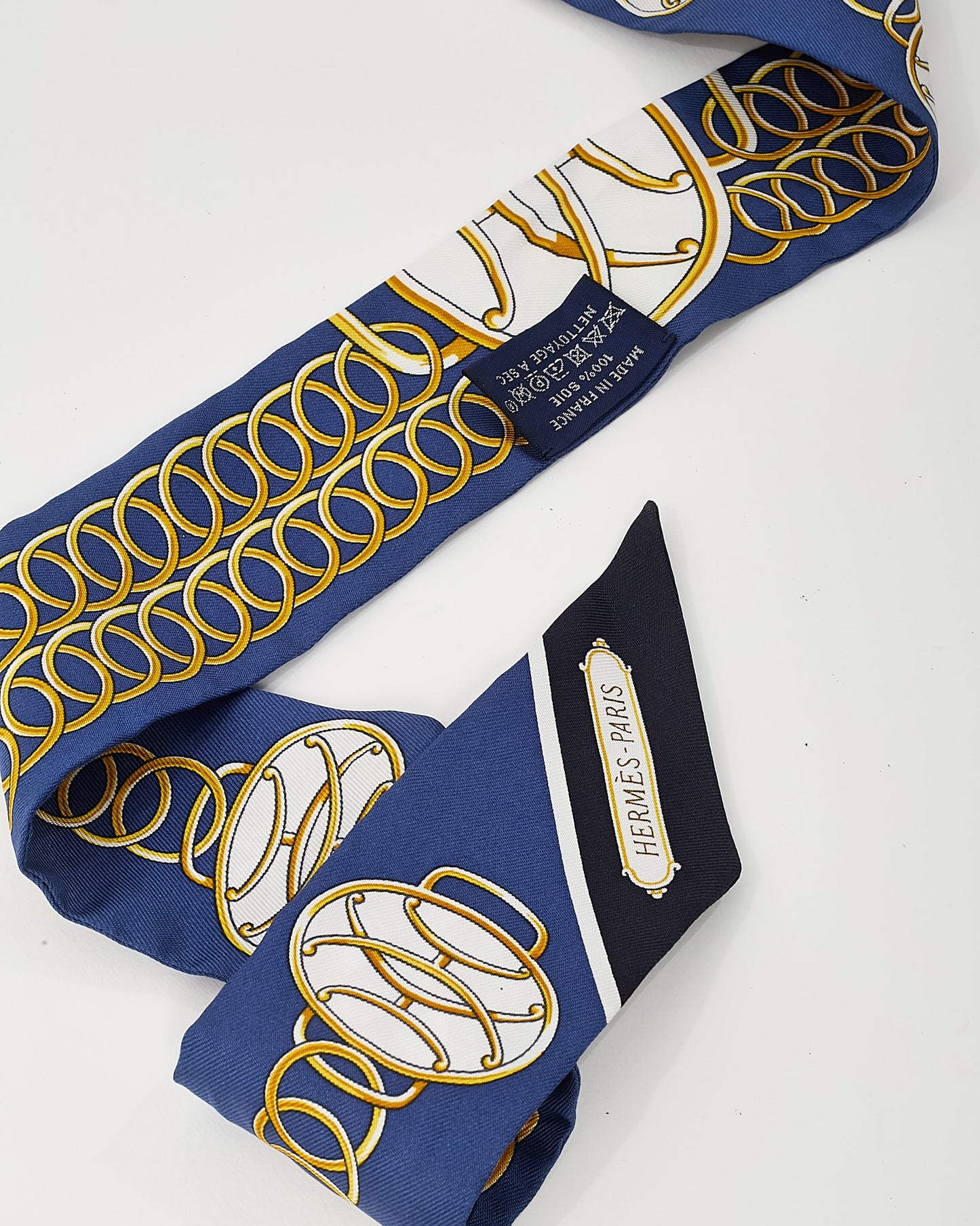 Hermès Navy/Gold/White Multi "Lift Profile" Silk Twilly Scarf