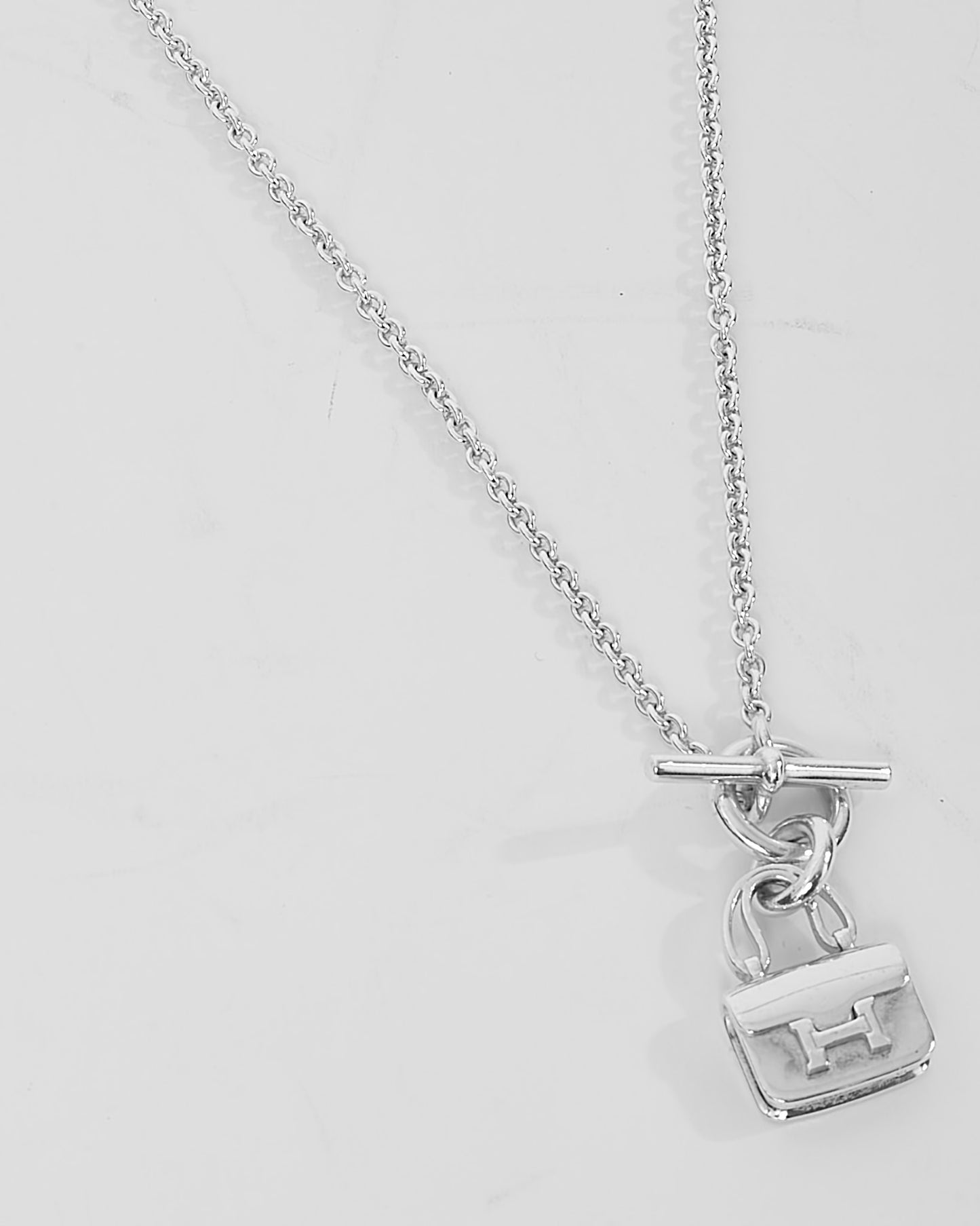 Hermès Sterling Silver Amulettes Constance Pendant Necklace