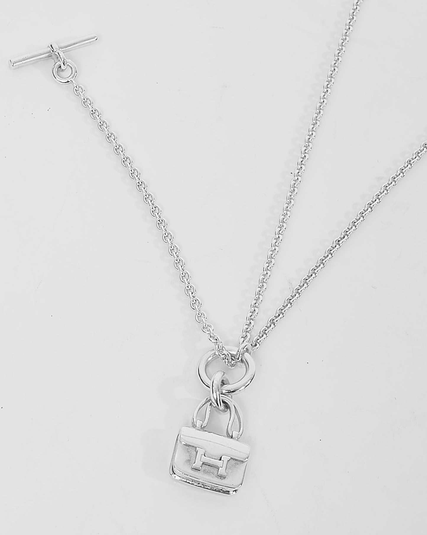 Hermès Sterling Silver Amulettes Constance Pendant Necklace