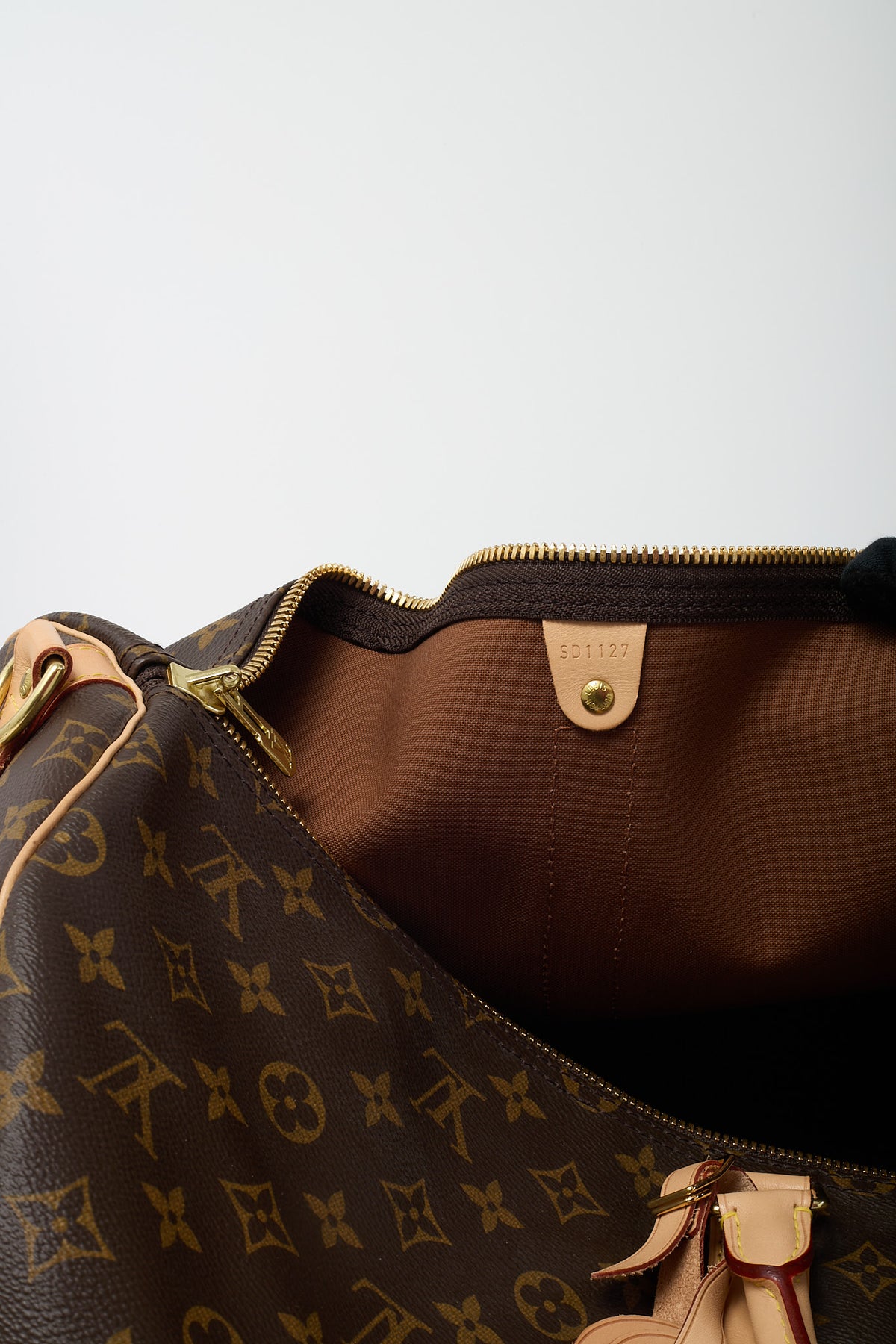 Louis Vuitton Monogram Coated Canvas Keepall Bandoulière 55 Bag