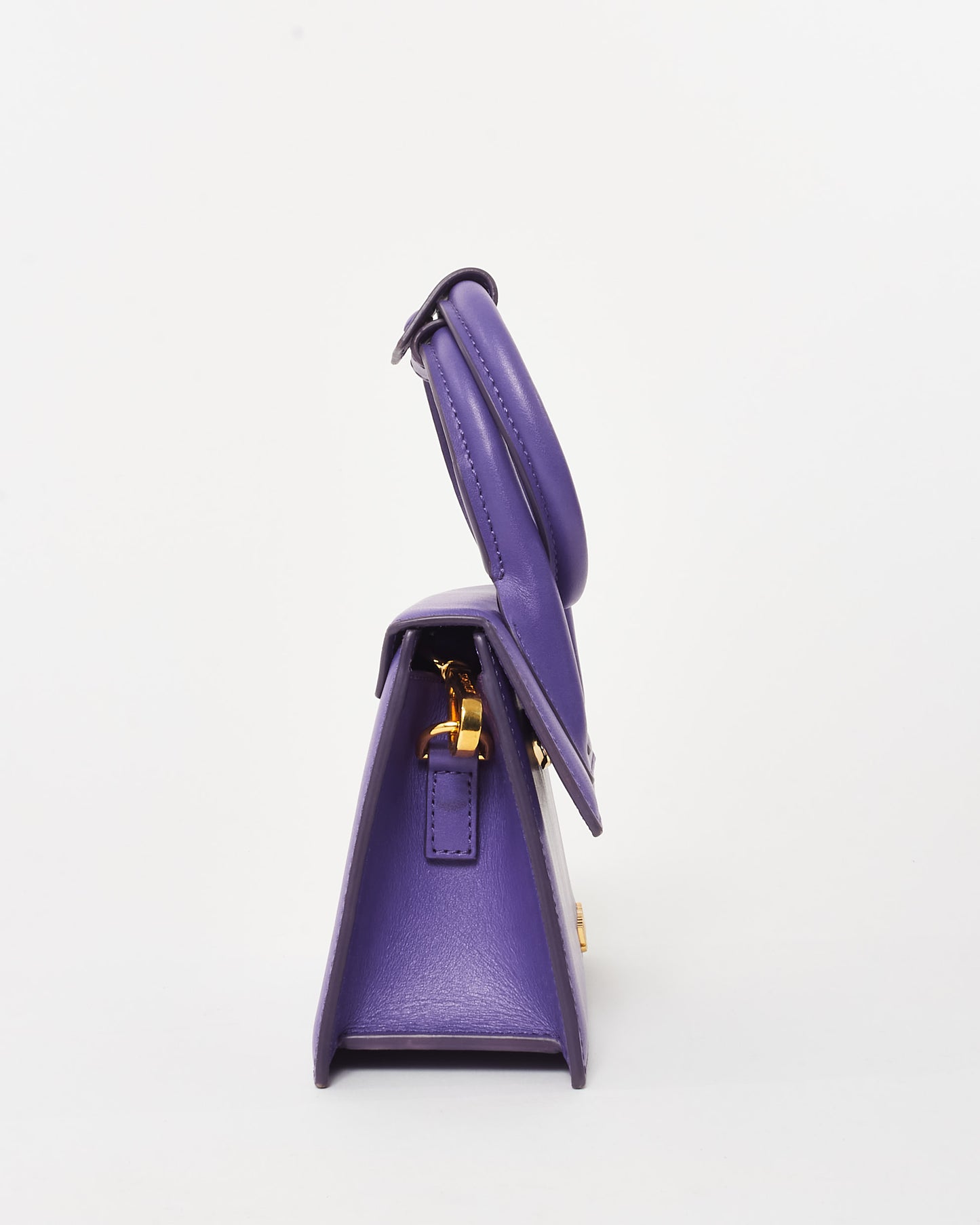 Jacquemus Pre-Owned Le Chiquito Noeud mini handbag in vibrant violet leather, featuring a structured trapezoidal silhouette, circular top handles, and gold-tone logo detailing on the front side view